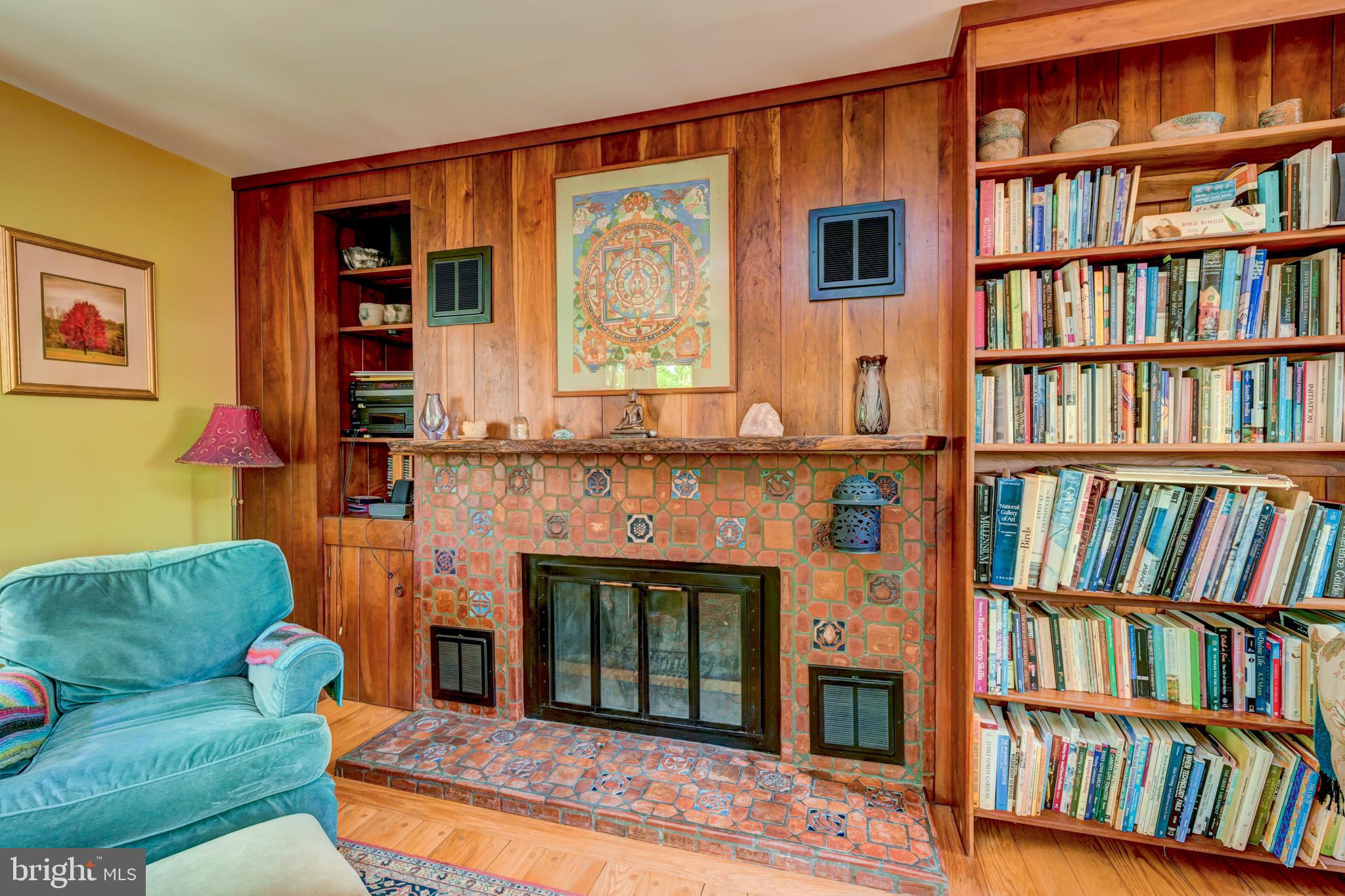 5613 Point Pleasant Pike Doylestown, PA 18902 - Photo 9 of 39 a living room with a couch and a book shelf