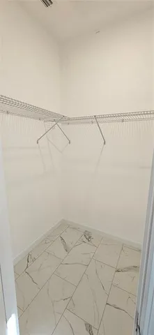 an empty room with a door