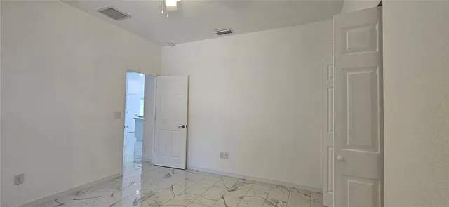 a view of room with stairs and a window