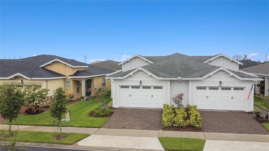 2557 Yellow Brick Road St. Cloud, FL 34772 - Photo 33 of 41 front view of a house with a street