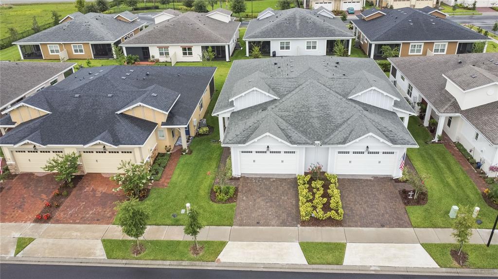 2557 Yellow Brick Road St. Cloud, FL 34772 - Photo 34 of 41 an aerial view of multiple houses