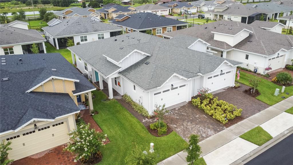 2557 Yellow Brick Road St. Cloud, FL 34772 - Photo 40 of 41 an aerial view of a house with a yard