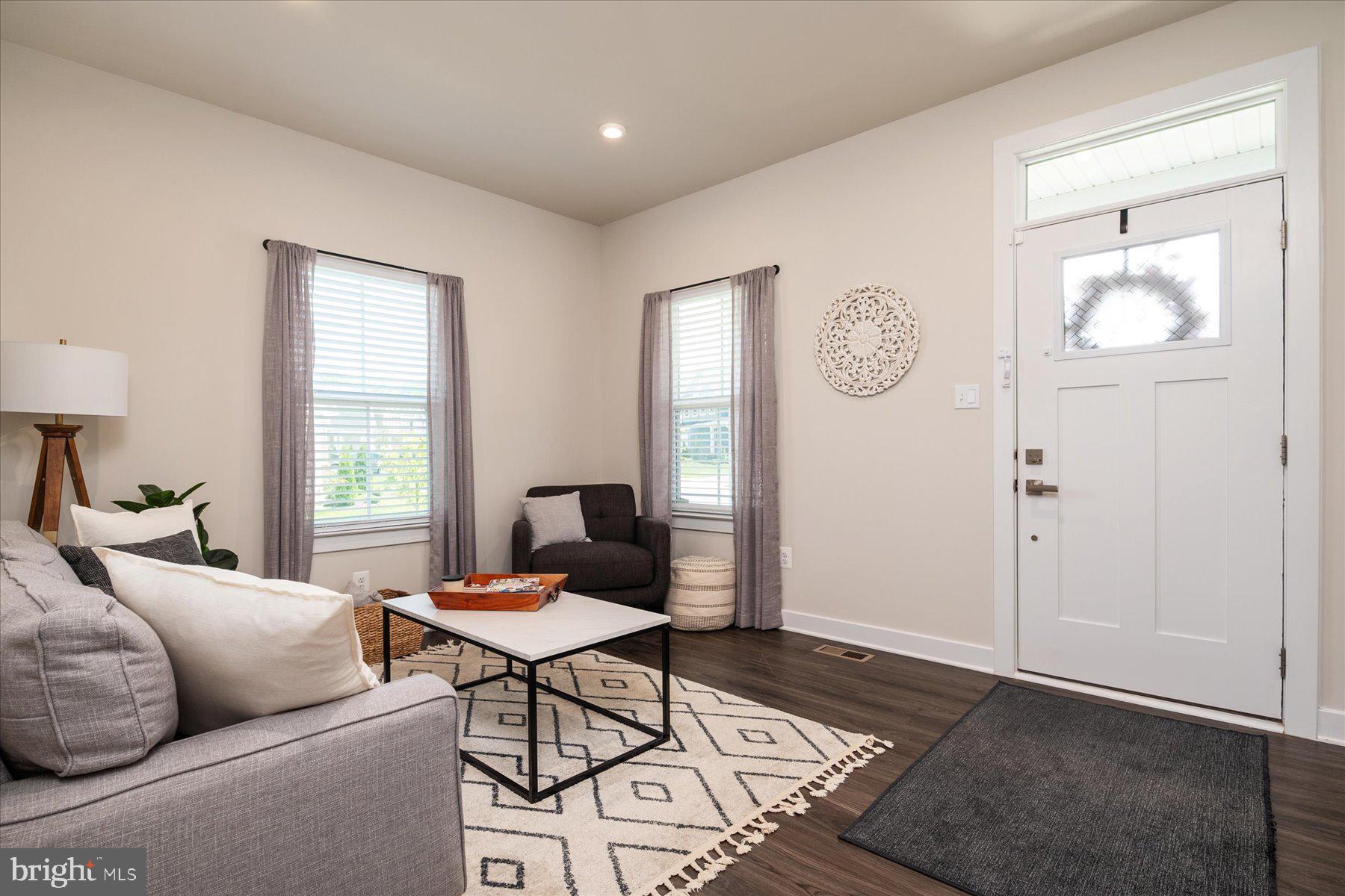 1261 Upper Patuxent Ridge Road Odenton, MD 21113 - Photo 14 of 58 a living room with furniture and a window