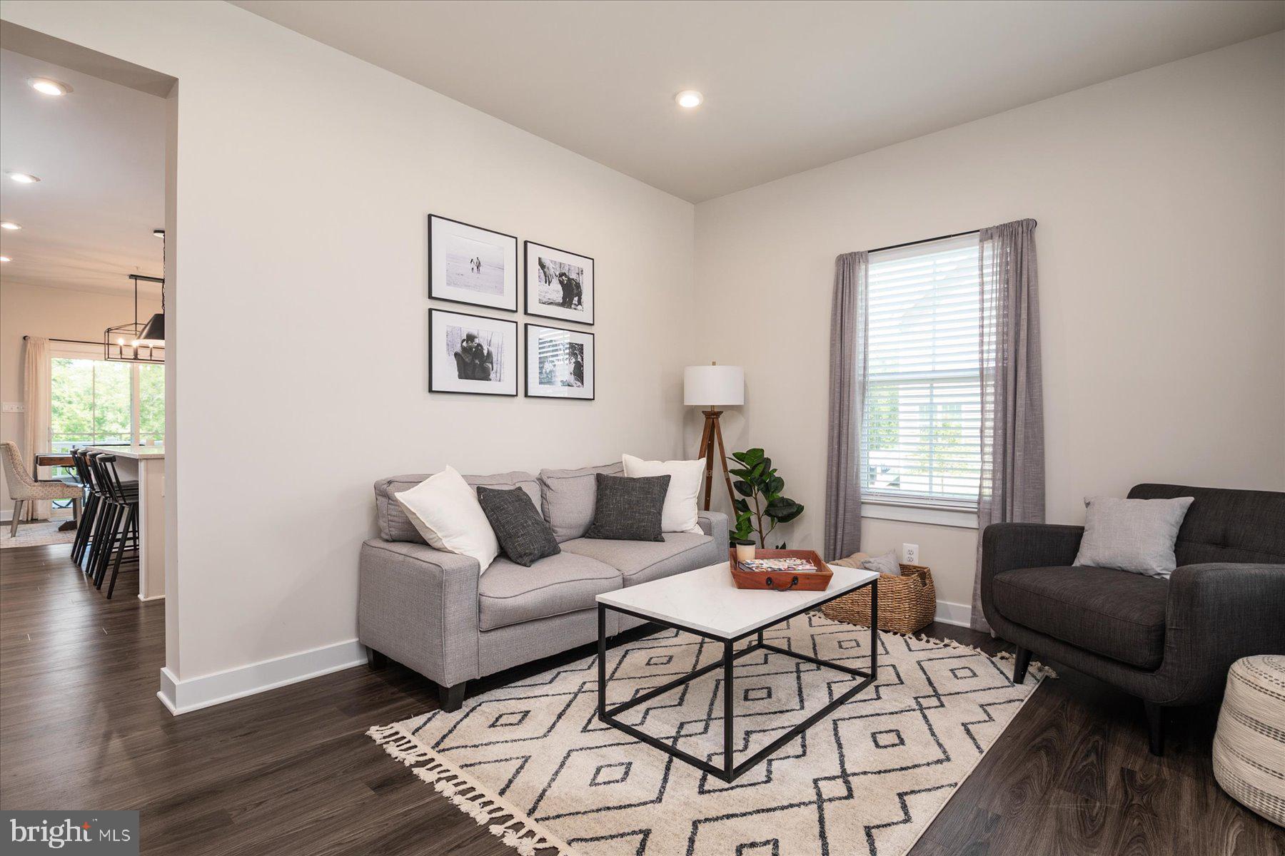 1261 Upper Patuxent Ridge Road Odenton, MD 21113 - Photo 15 of 58 a living room with furniture and wooden floor