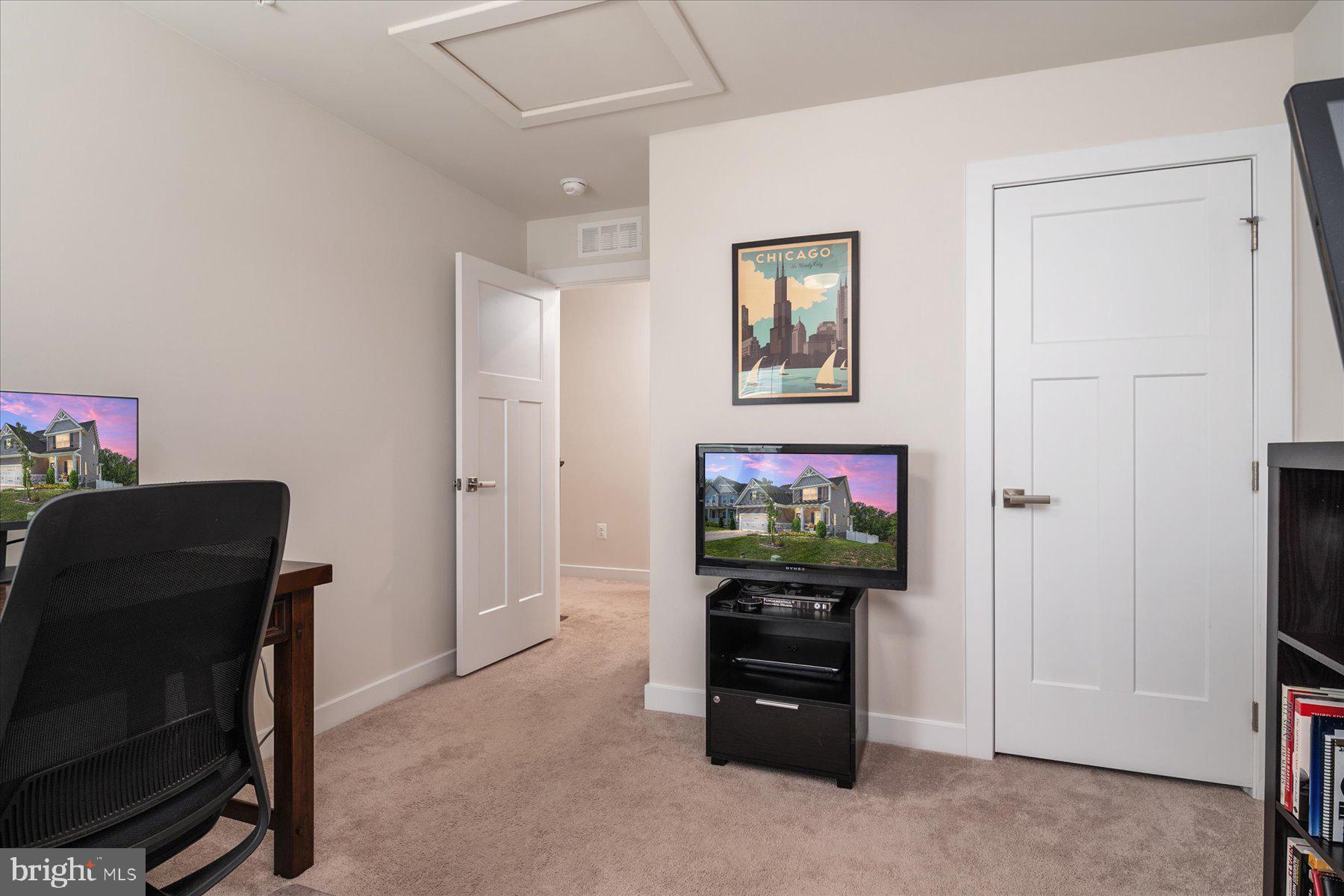 1261 Upper Patuxent Ridge Road Odenton, MD 21113 - Photo 23 of 58 a living room with furniture and a flat screen tv