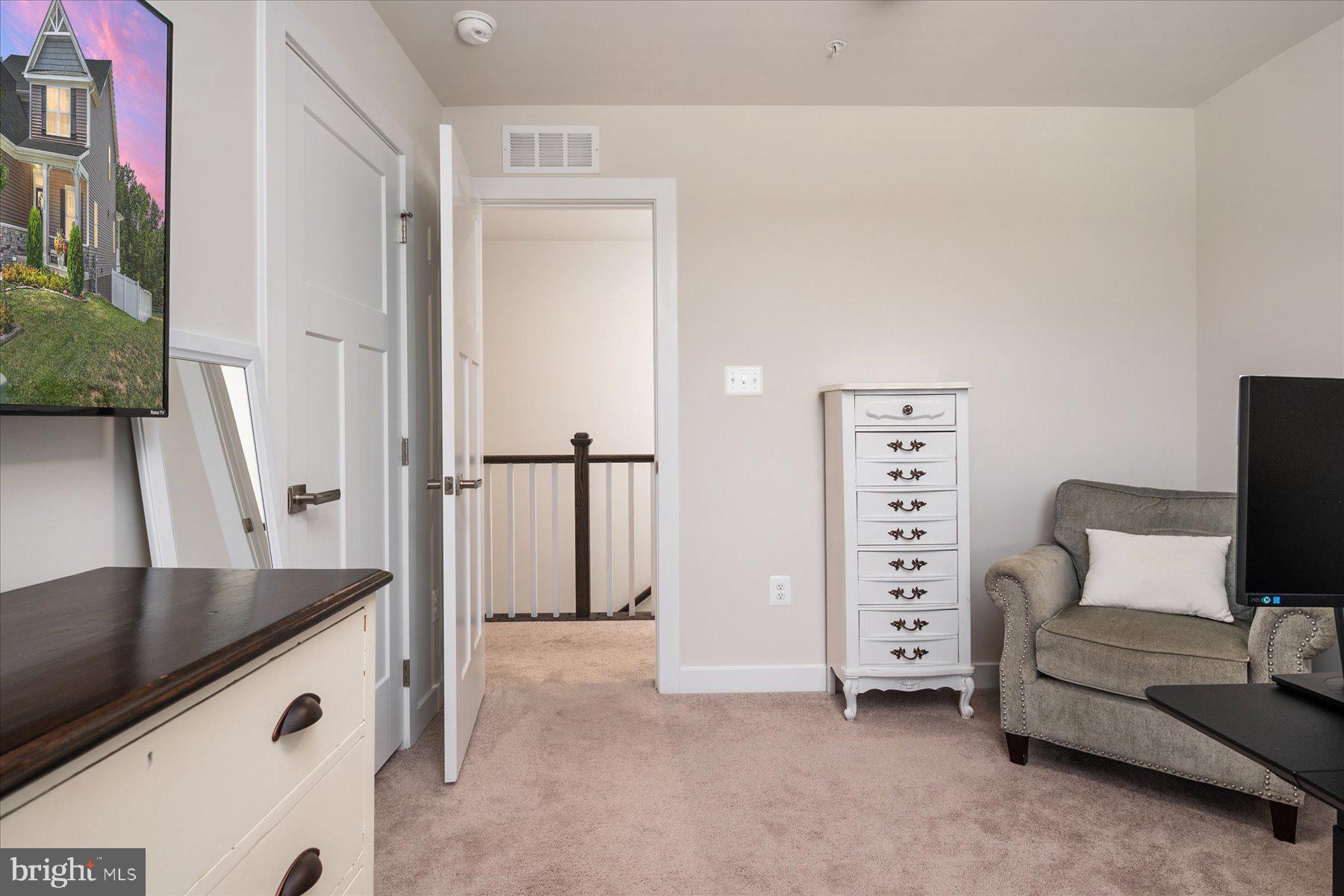 1261 Upper Patuxent Ridge Road Odenton, MD 21113 - Photo 25 of 58 a view of livingroom with furniture and cabinet