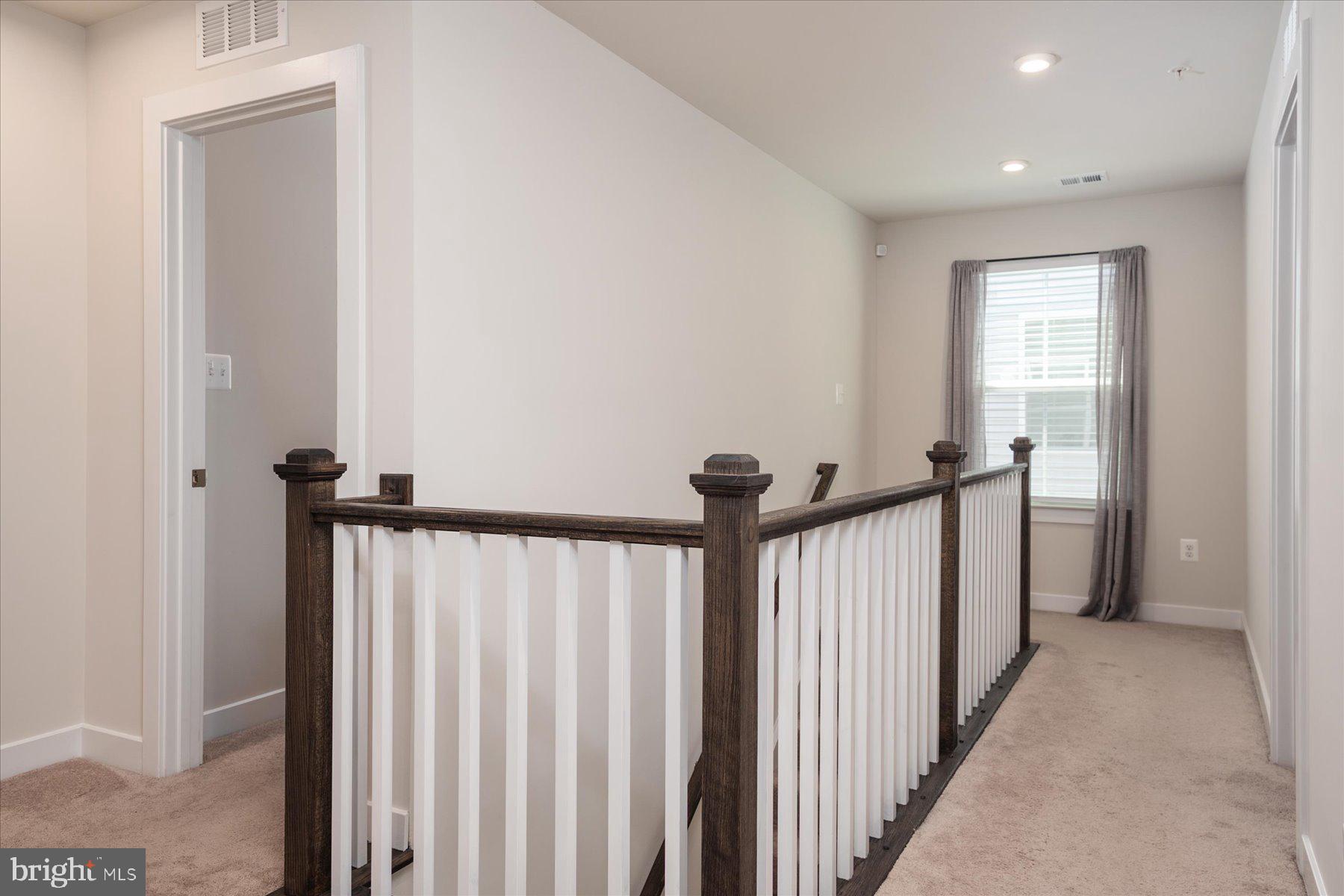 1261 Upper Patuxent Ridge Road Odenton, MD 21113 - Photo 27 of 58 a view of a hallway with a elevator
