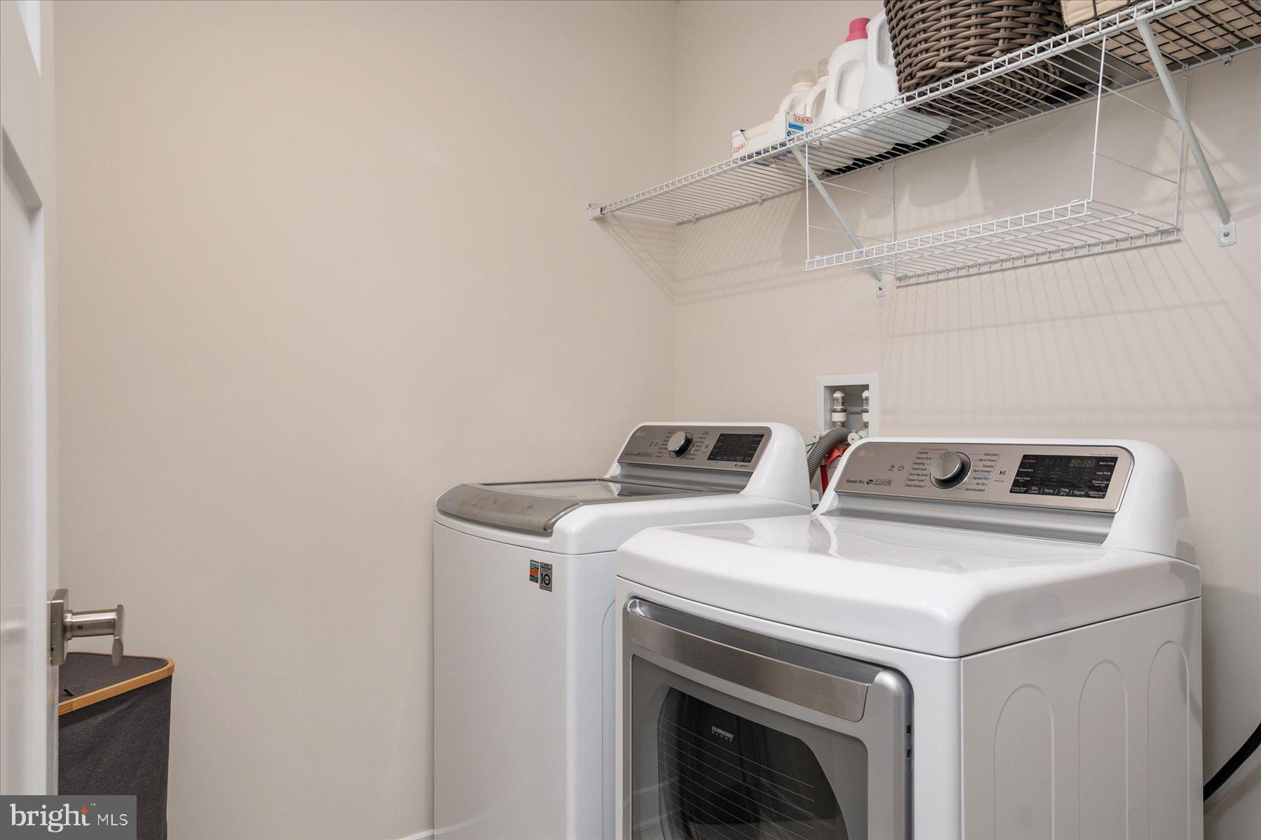 1261 Upper Patuxent Ridge Road Odenton, MD 21113 - Photo 28 of 58 a utility room with dryer and washer
