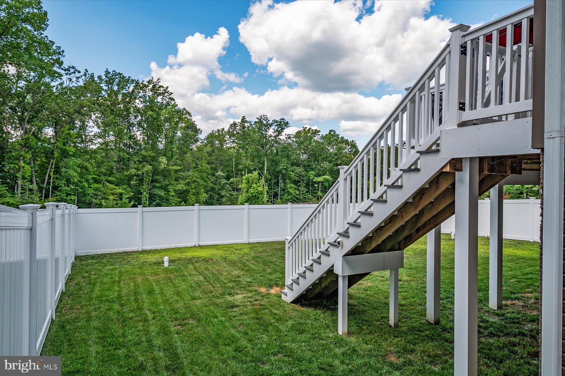 1261 Upper Patuxent Ridge Road Odenton, MD 21113 - Photo 40 of 58 a balcony with view of trees in the background