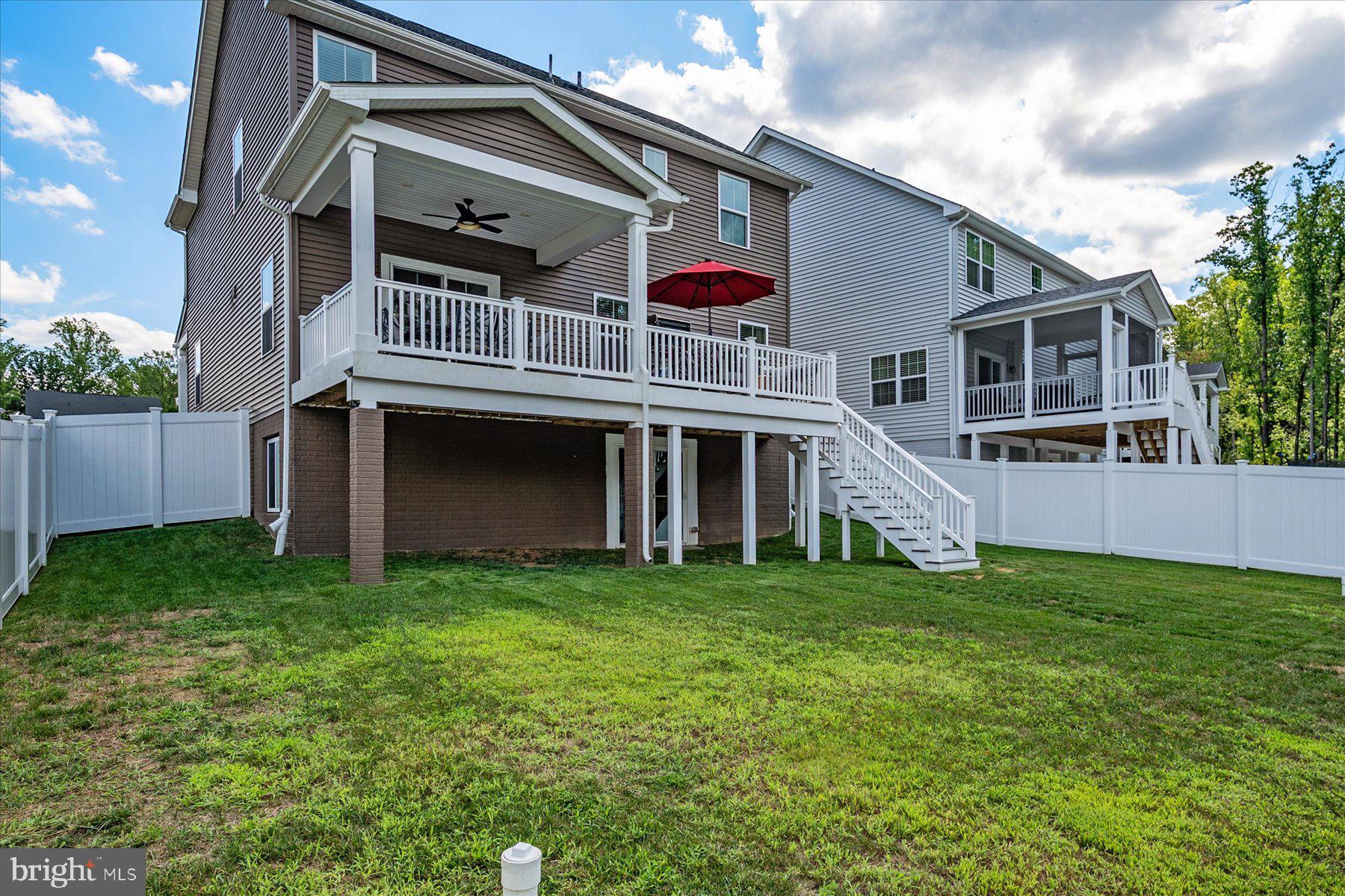 1261 Upper Patuxent Ridge Road Odenton, MD 21113 - Photo 41 of 58 a view of a house with a yard