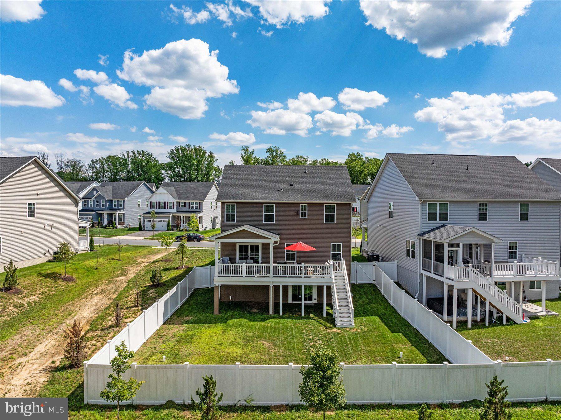1261 Upper Patuxent Ridge Road Odenton, MD 21113 - Photo 42 of 58 a view of a house with swimming pool and sitting area