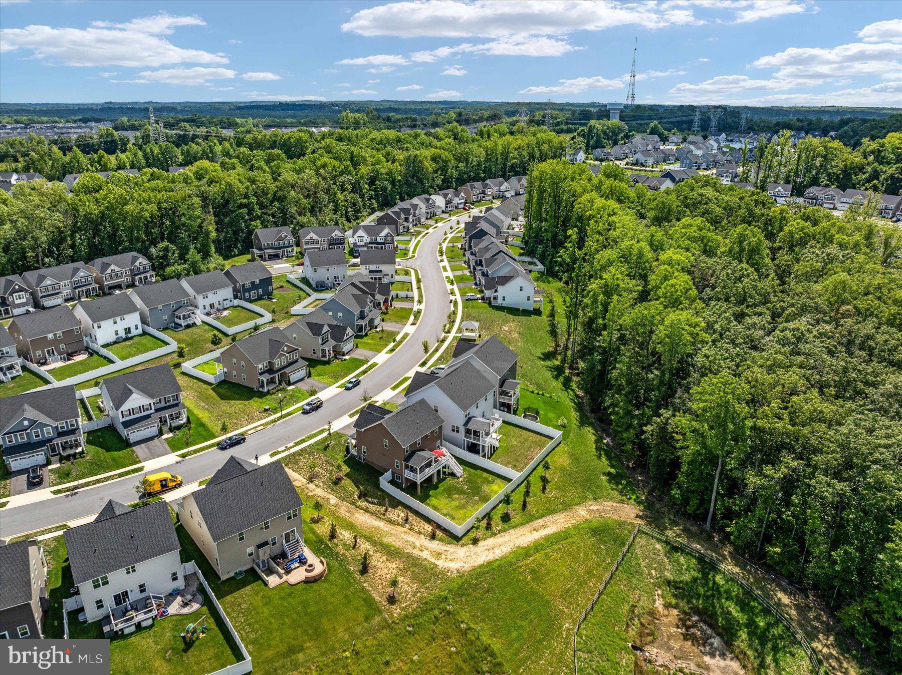 1261 Upper Patuxent Ridge Road Odenton, MD 21113 - Photo 46 of 58 an aerial view of a house with a garden