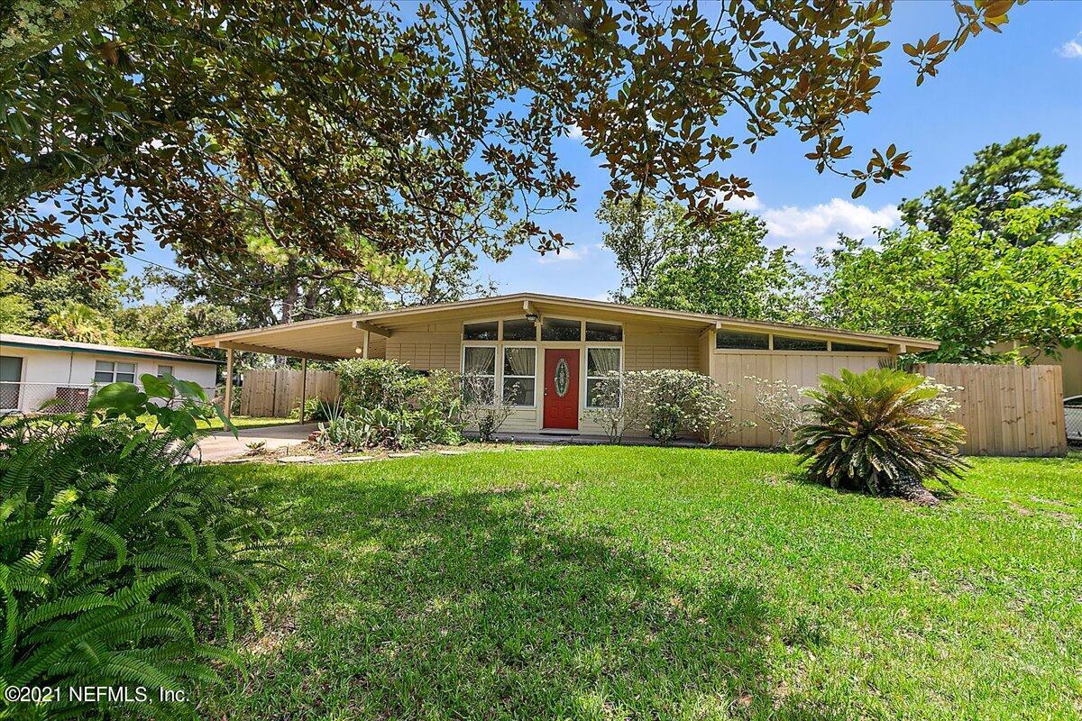 7444 Sandhurst Road South Jacksonville, FL 32277 - Photo 1 of 20 a front view of a house with a yard
