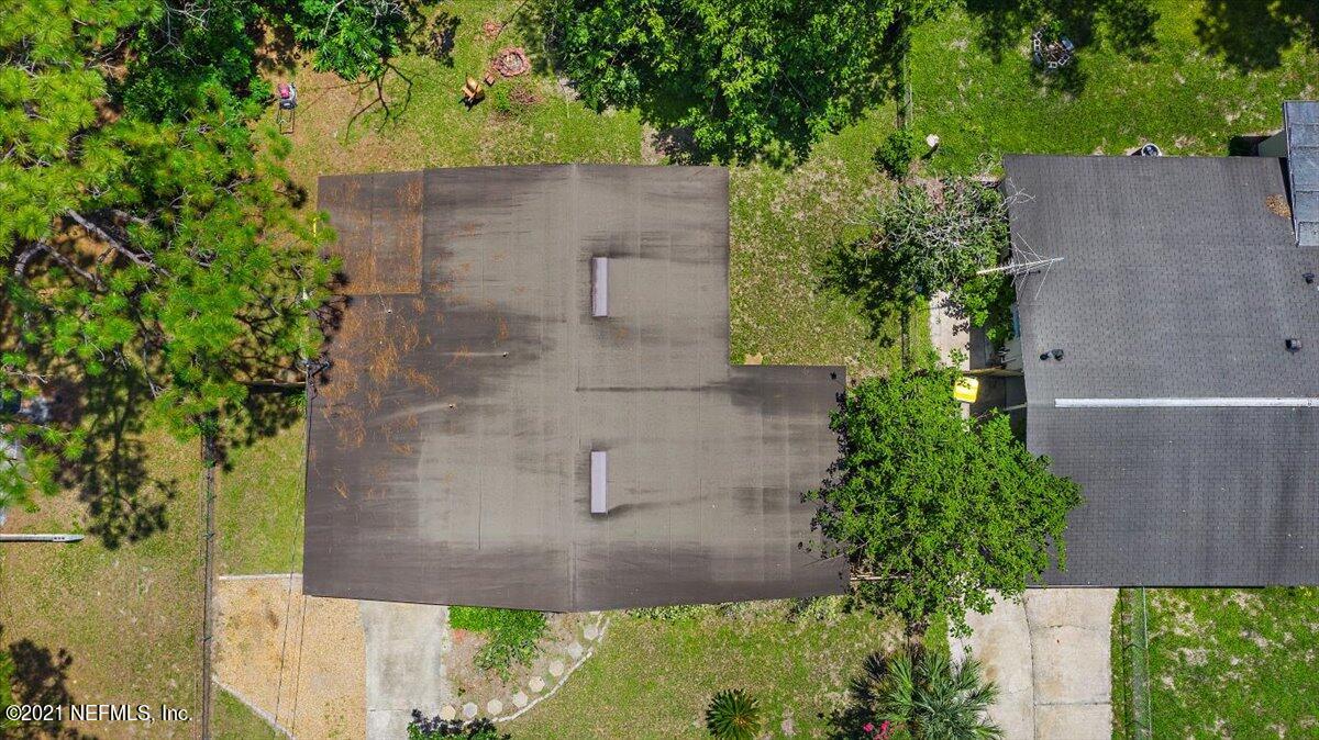 7444 Sandhurst Road South Jacksonville, FL 32277 - Photo 17 of 20 an aerial view of a house with outdoor space and a lake view