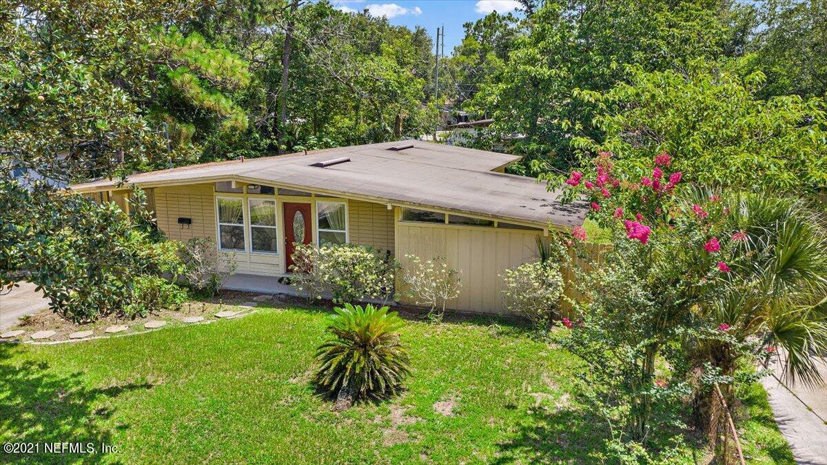 7444 Sandhurst Road South Jacksonville, FL 32277 - Photo 19 of 20 a front view of house with yard and green space