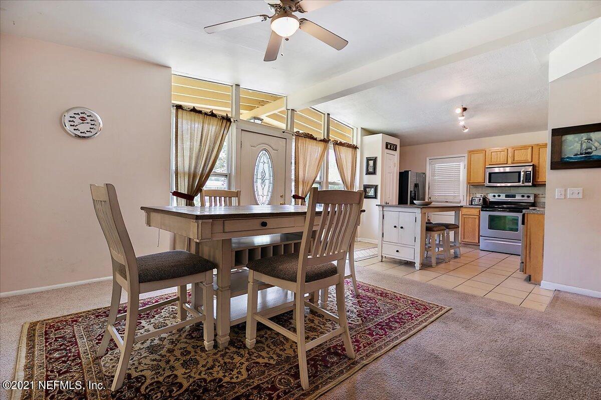 7444 Sandhurst Road South Jacksonville, FL 32277 - Photo 10 of 20 a view of a dining room with furniture
