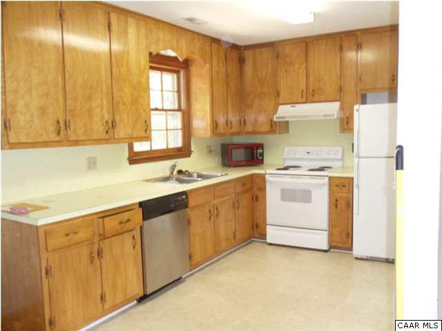 Kitchen with a window over the sink allows you a view of the backyard