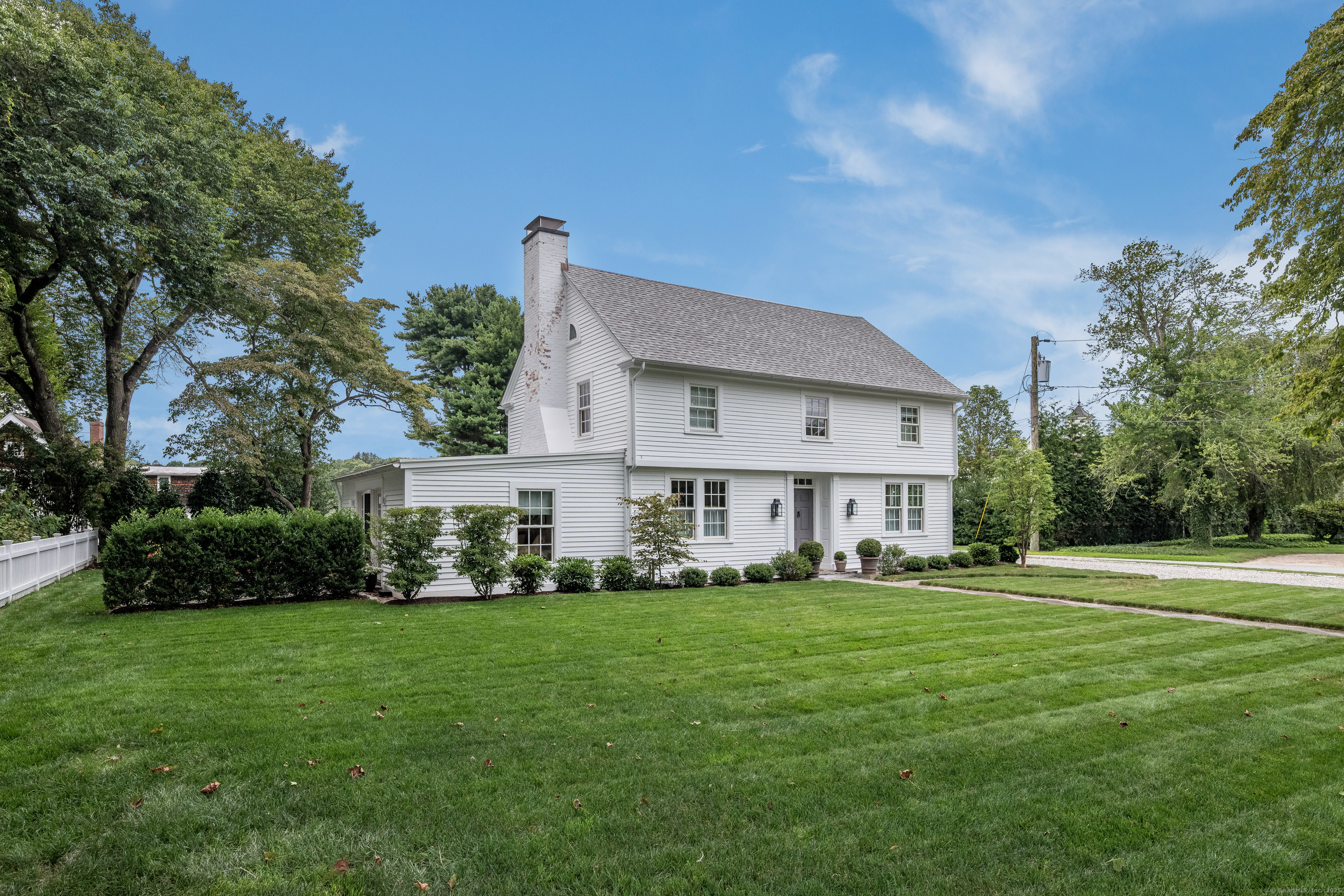 8 Lieutenant River Lane Old Lyme, CT 06371 - Photo 32 of 38 a front view of house with yard and green space