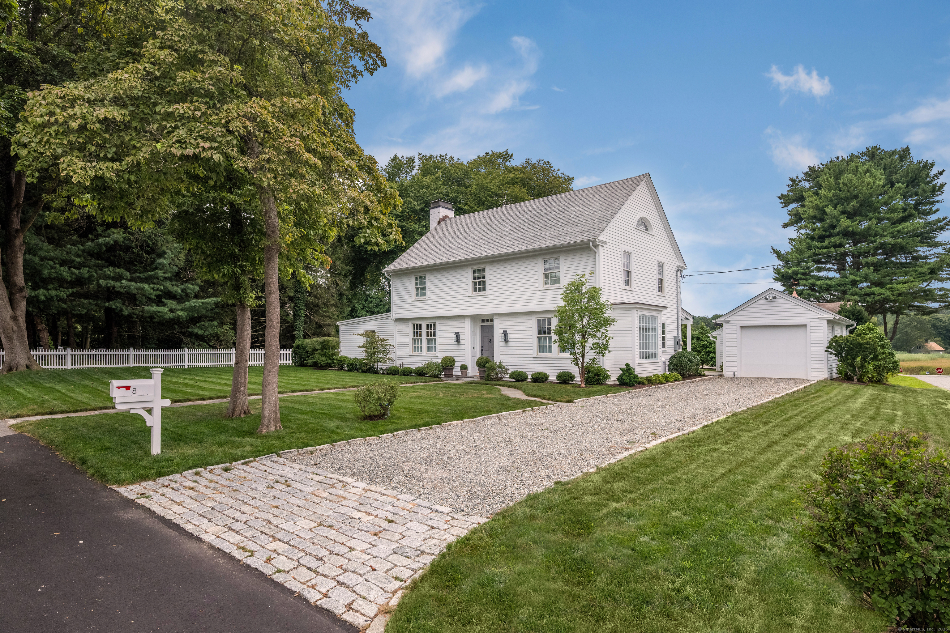 8 Lieutenant River Lane Old Lyme, CT 06371 - Photo 33 of 38 front view of a house with a yard