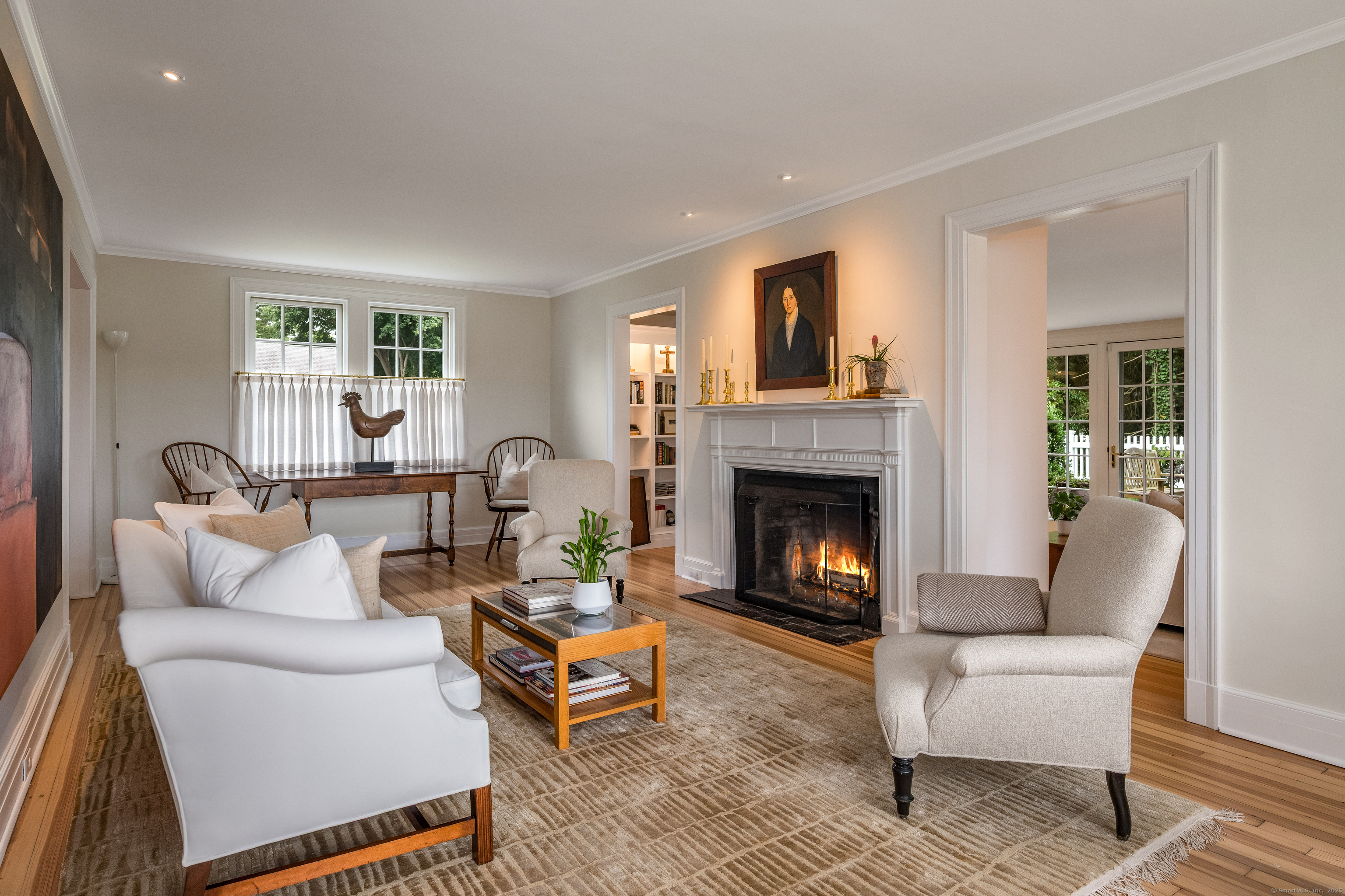 8 Lieutenant River Lane Old Lyme, CT 06371 - Photo 6 of 38 a living room with furniture and a fireplace