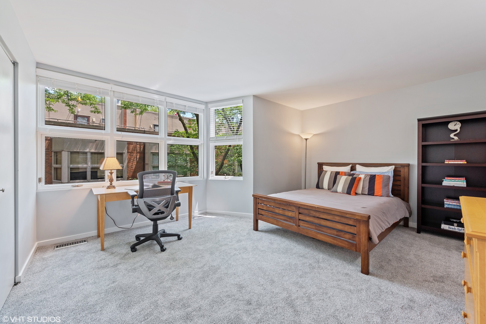 2024 North Racine Avenue, Unit M Chicago, IL 60614 - Photo 14 of 22 a bedroom with furniture and a window