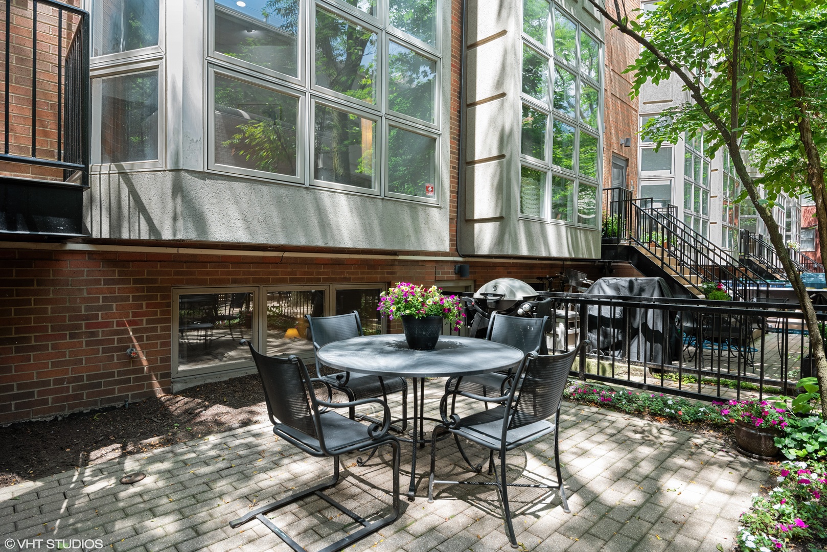 2024 North Racine Avenue, Unit M Chicago, IL 60614 - Photo 3 of 22 a view of a chairs and table in patio