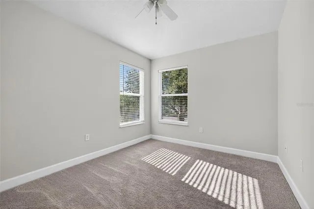 an empty room with windows