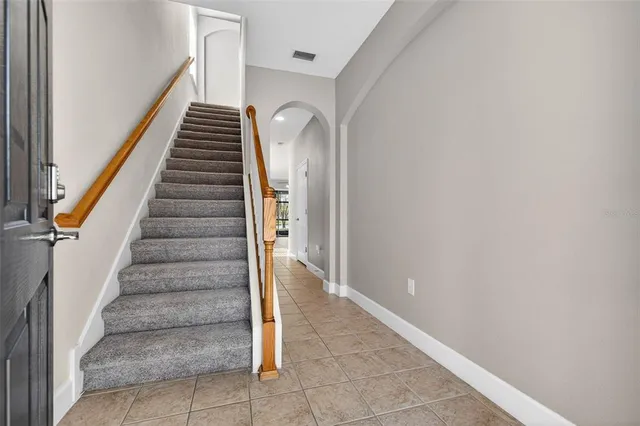 a view of an entryway with staircase