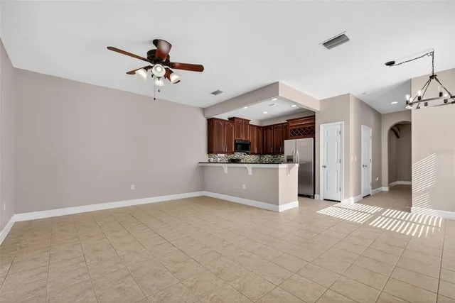 a view of a kitchen with a sink and cabinets