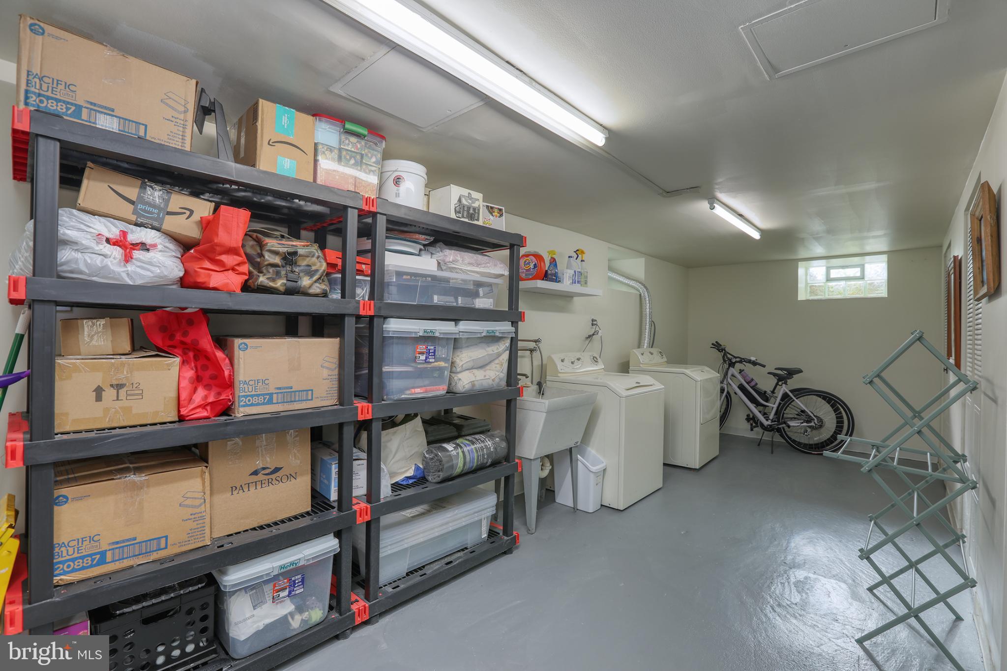 500 East Lancaster Avenue, Unit 126A Wayne, PA 19087 - Photo 17 of 22 Laundry with organized storage space.