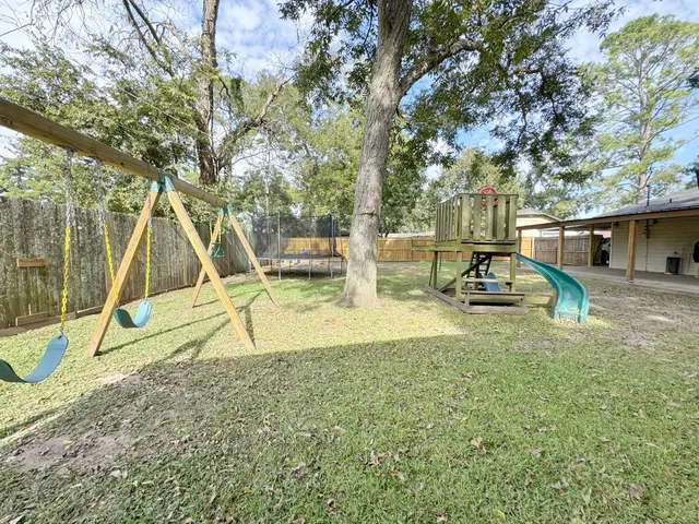 a view of a park with swings