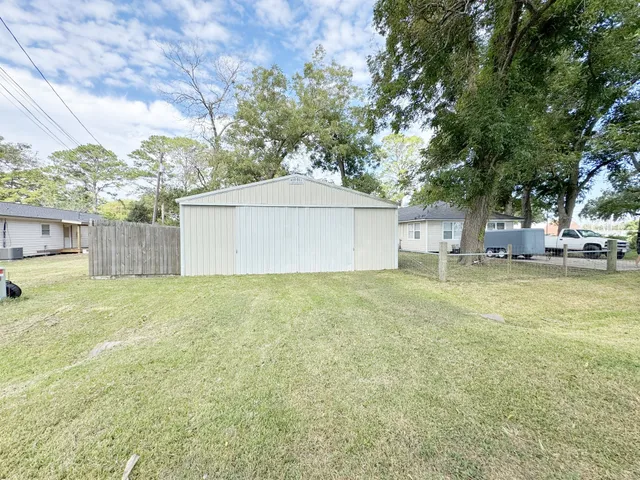 a house view with a garden space