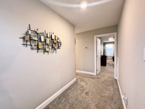 a view of a livingroom with wooden floor