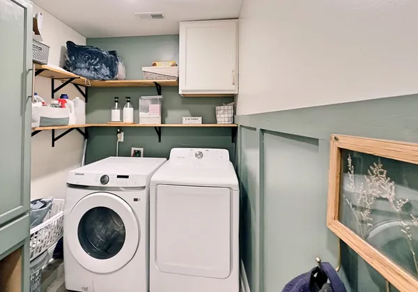 a utility room with dryer and washer