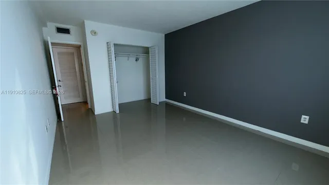 an empty room with a door