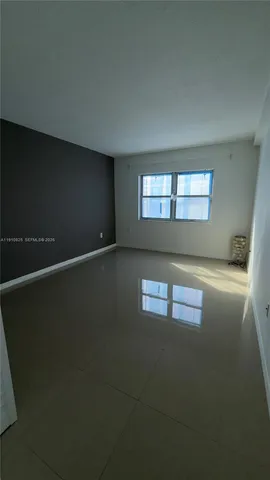 a view of empty room with window