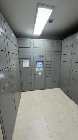 a bedroom with a bed and a shower