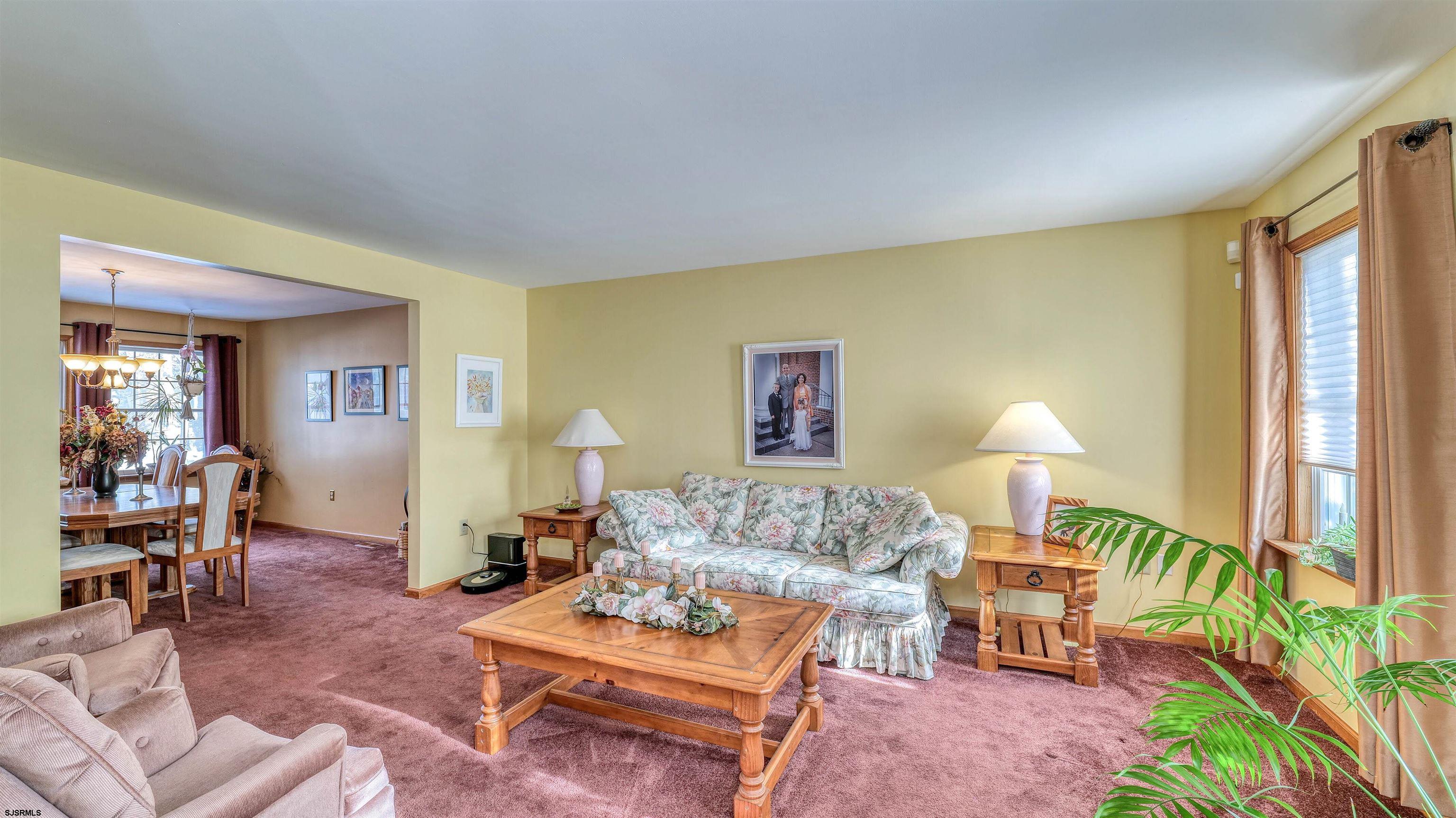 627 East Seaview Ridge Drive Galloway Township, NJ 08205 - Photo 13 of 50 a living room with furniture and a lamp