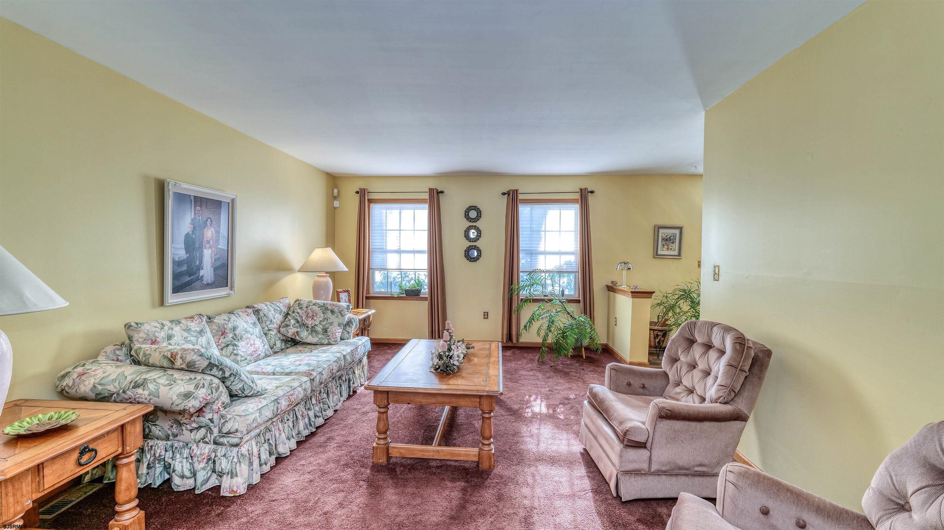 627 East Seaview Ridge Drive Galloway Township, NJ 08205 - Photo 15 of 50 a living room with furniture and a potted plant