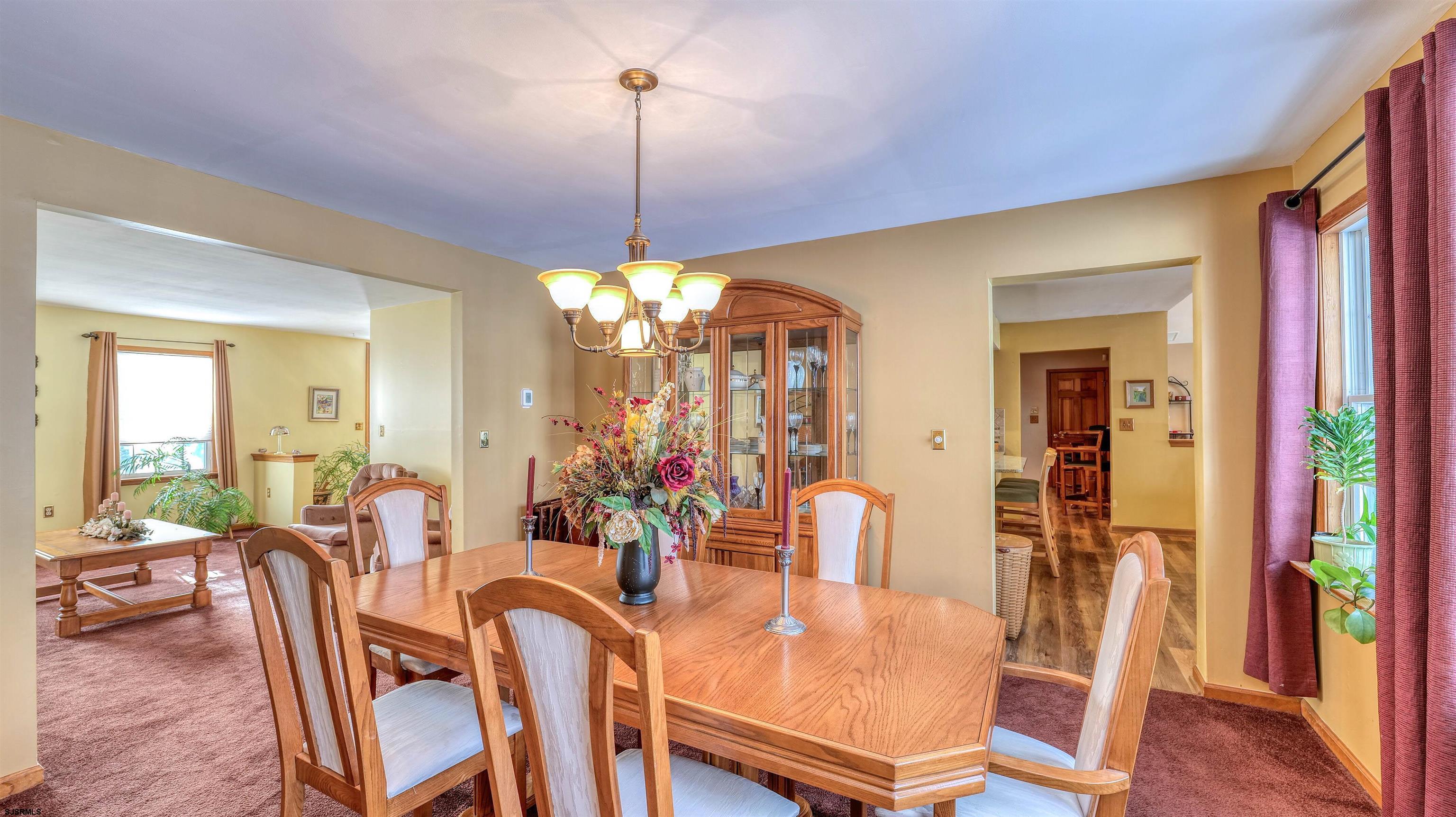 627 East Seaview Ridge Drive Galloway Township, NJ 08205 - Photo 17 of 50 a view of a dining room with furniture window and wooden floor