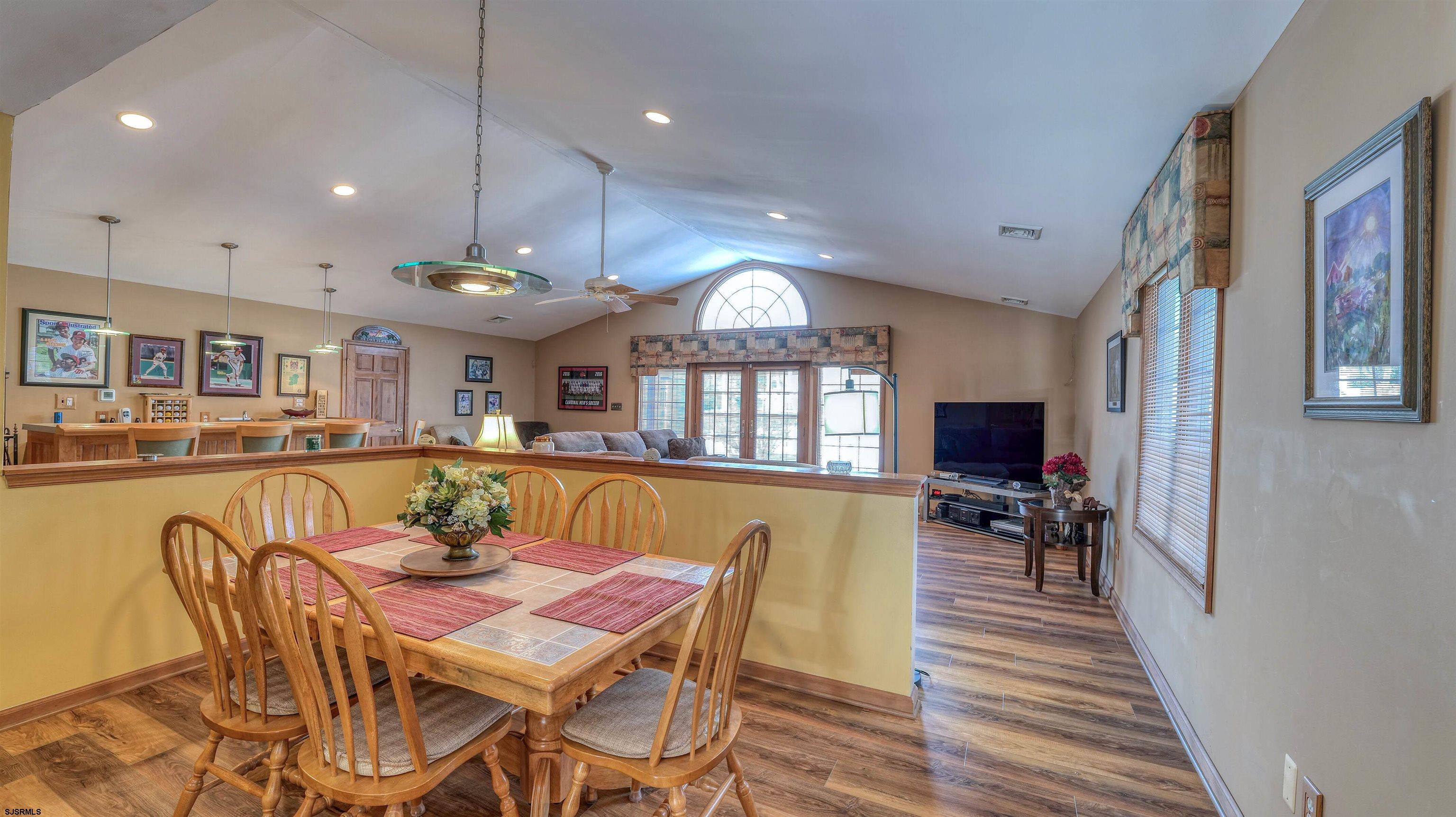627 East Seaview Ridge Drive Galloway Township, NJ 08205 - Photo 21 of 50 a view of a dining room with furniture window and wooden floor