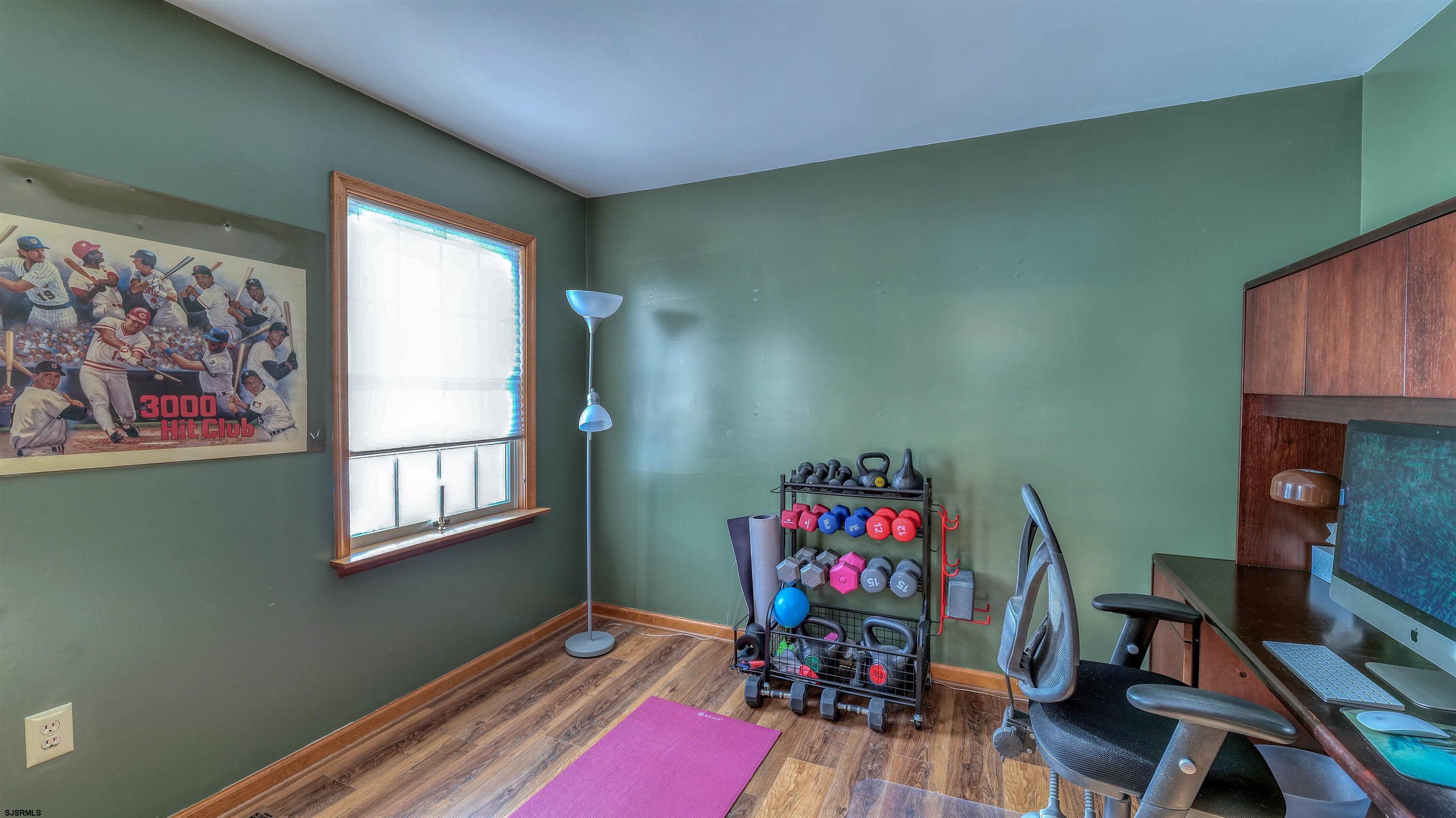 627 East Seaview Ridge Drive Galloway Township, NJ 08205 - Photo 28 of 50 a view of a workspace with furniture and a window
