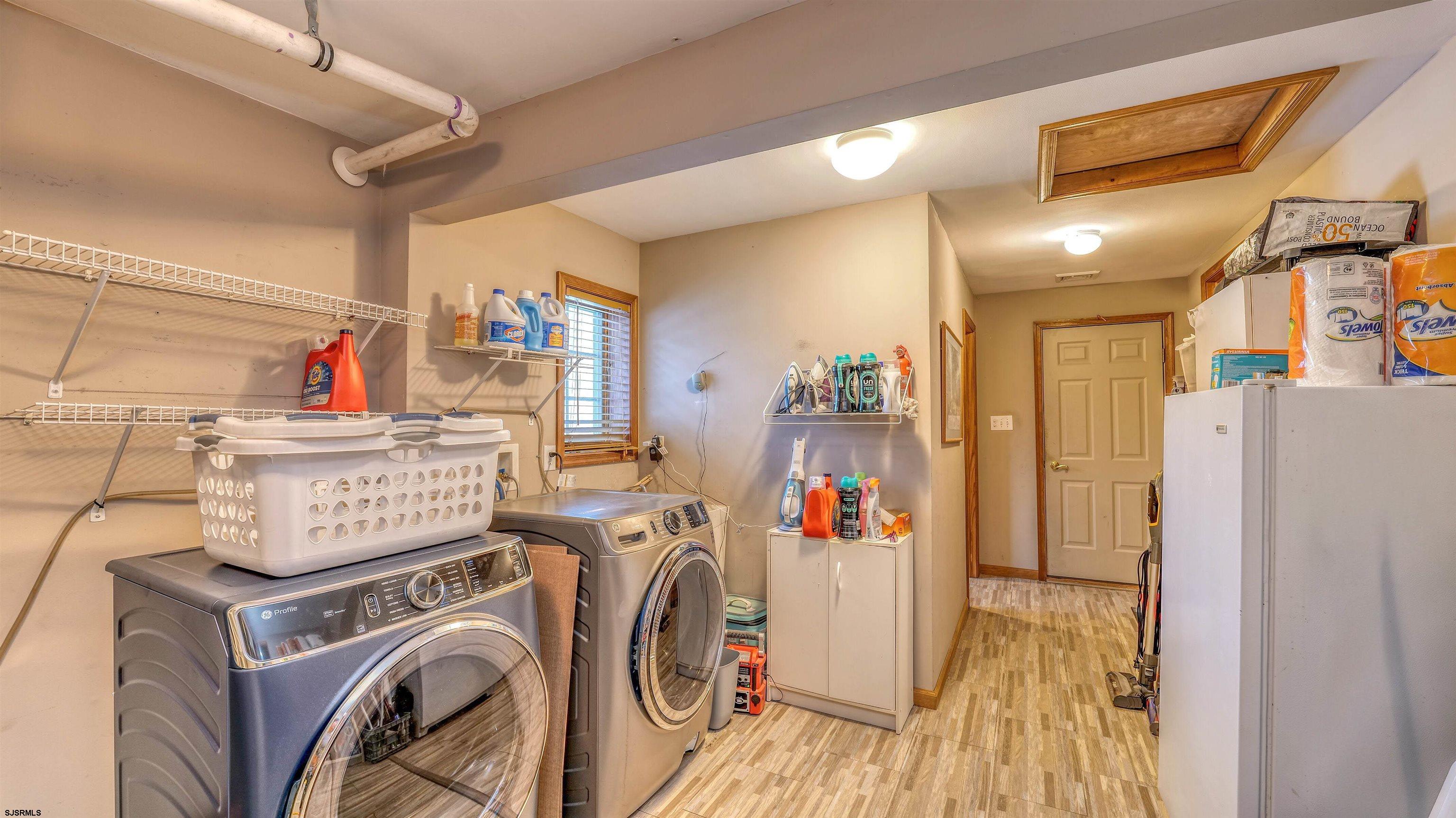 627 East Seaview Ridge Drive Galloway Township, NJ 08205 - Photo 38 of 50 a storage room with washer and dryer