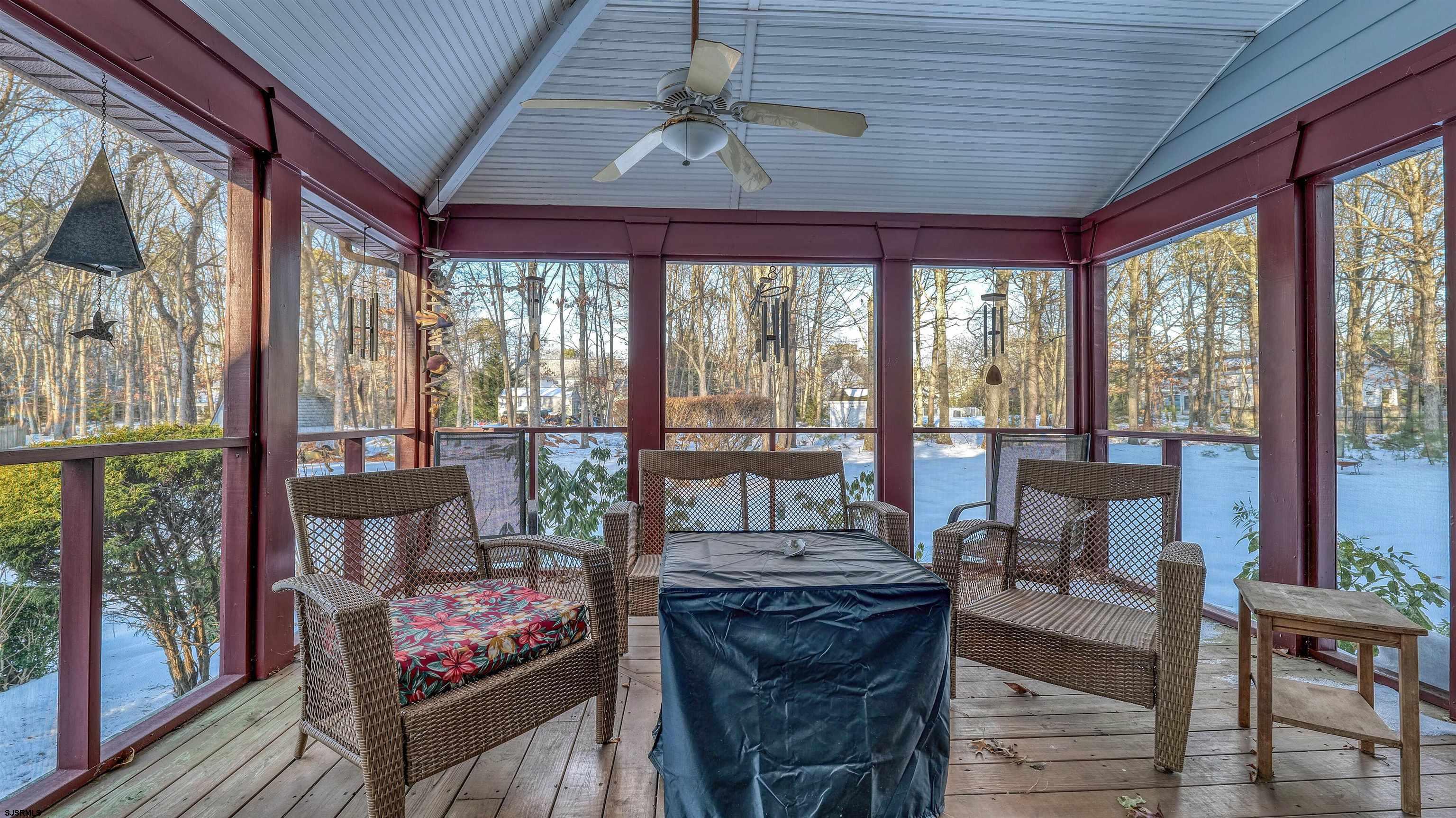 627 East Seaview Ridge Drive Galloway Township, NJ 08205 - Photo 40 of 50 a living room with furniture and a floor to ceiling window