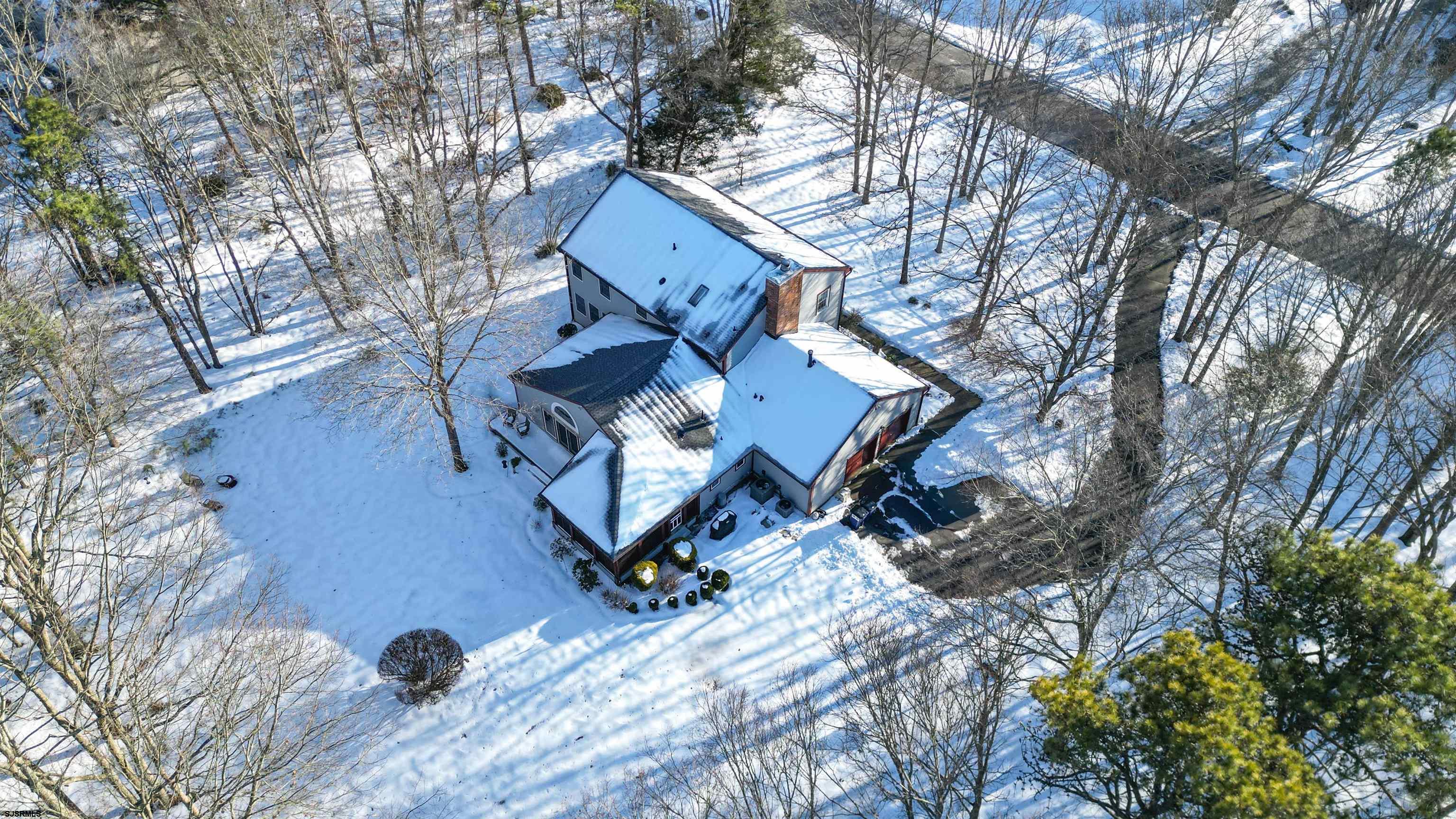 627 East Seaview Ridge Drive Galloway Township, NJ 08205 - Photo 44 of 50 a view of a house with a yard