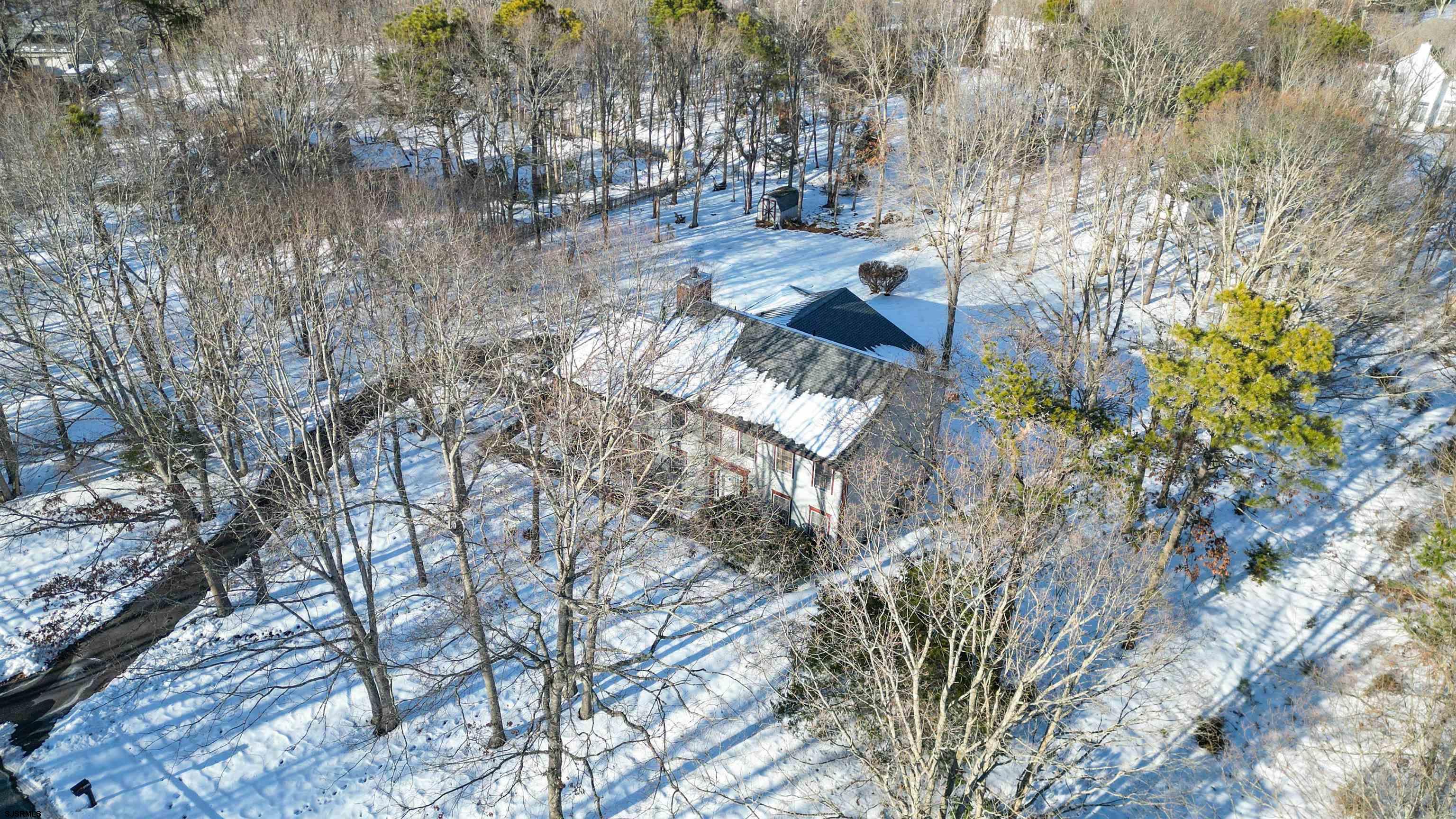 627 East Seaview Ridge Drive Galloway Township, NJ 08205 - Photo 45 of 50 a view of water with lots of bushes