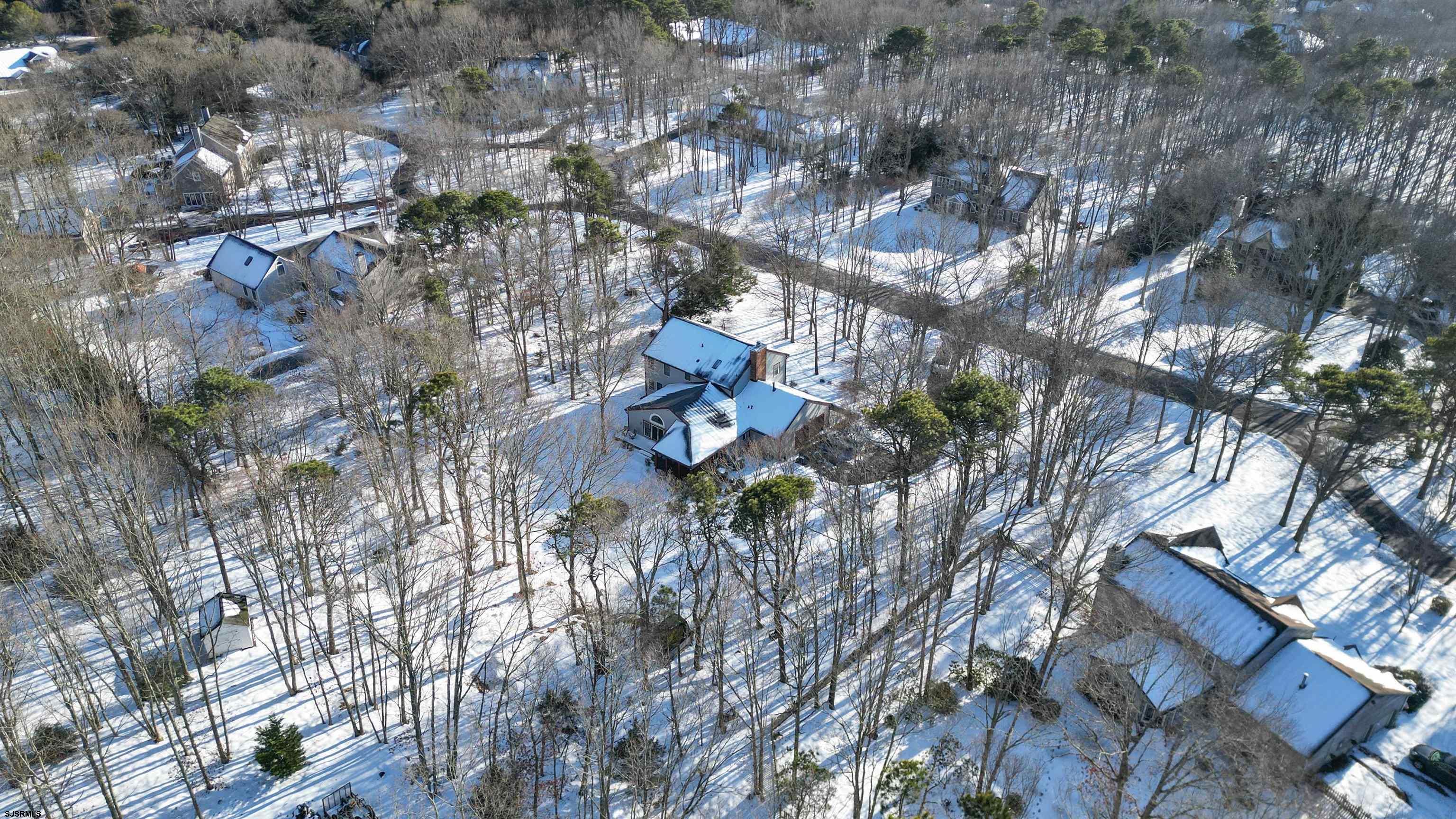 627 East Seaview Ridge Drive Galloway Township, NJ 08205 - Photo 46 of 50 a backyard of a house with lots of green space