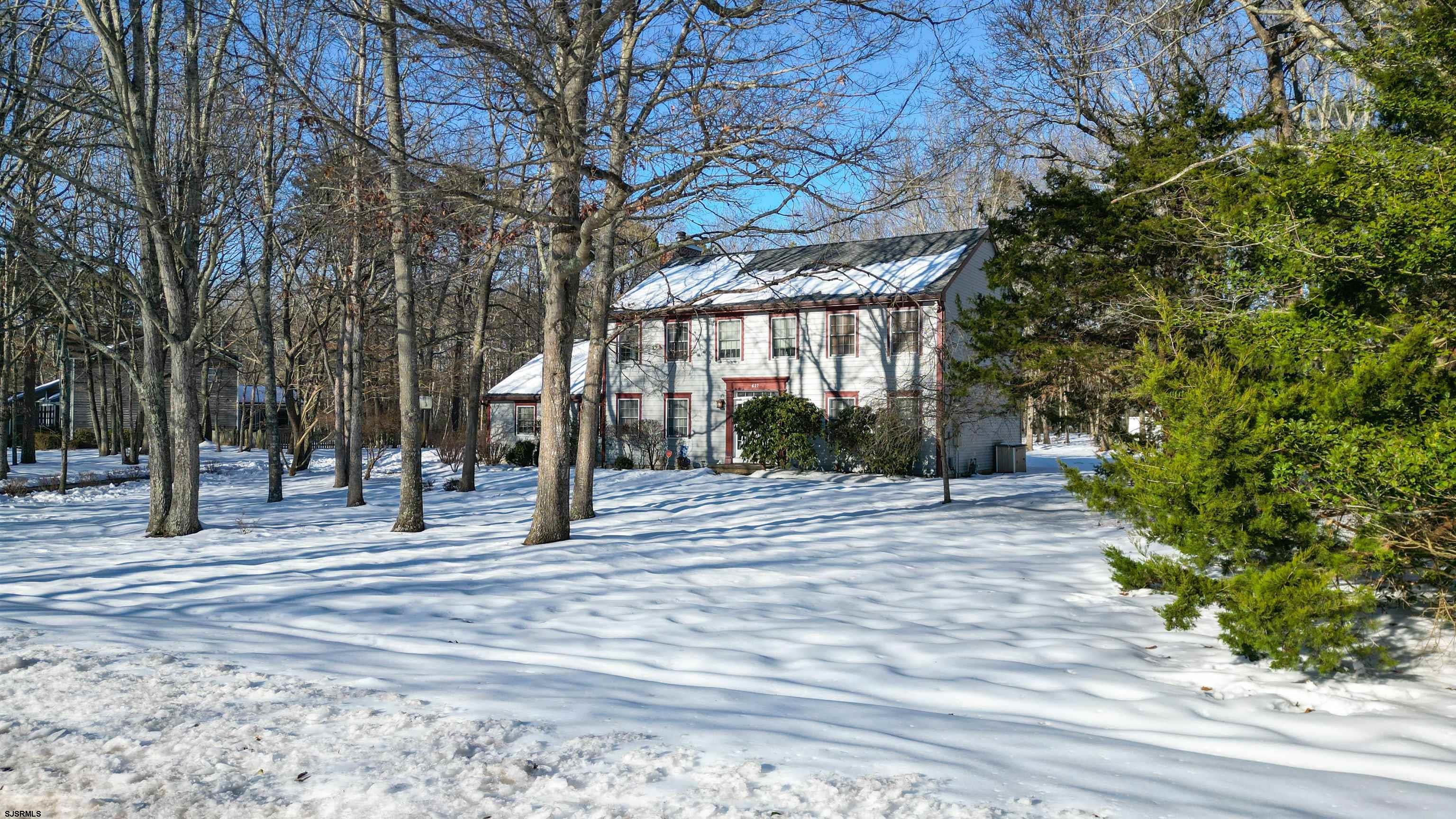 627 East Seaview Ridge Drive Galloway Township, NJ 08205 - Photo 9 of 50 a view of outdoor space with trees