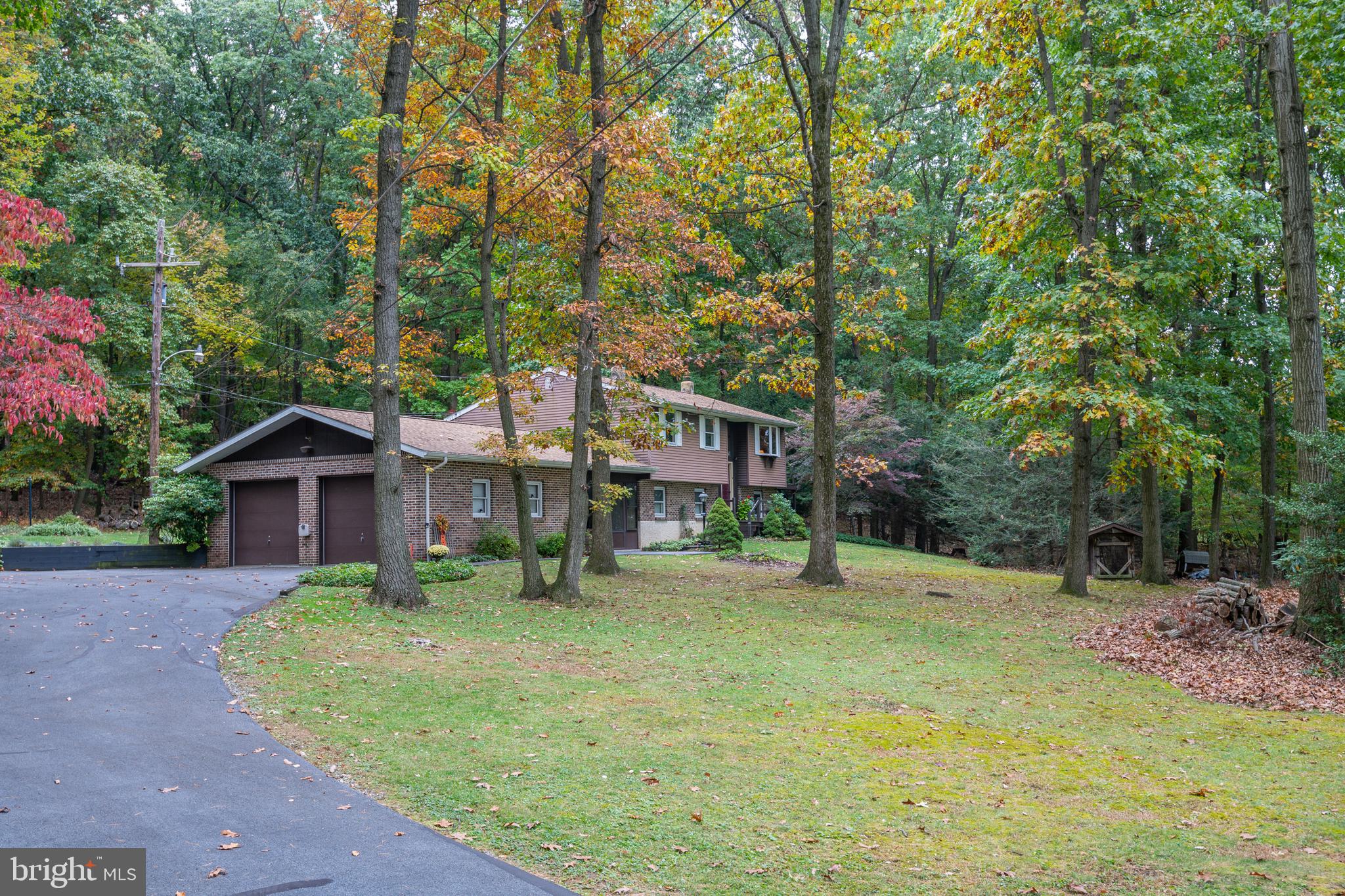 2901 Mannerchor Road Temple, PA 19560 - Photo 1 of 27 Paved Drive and Front Yard