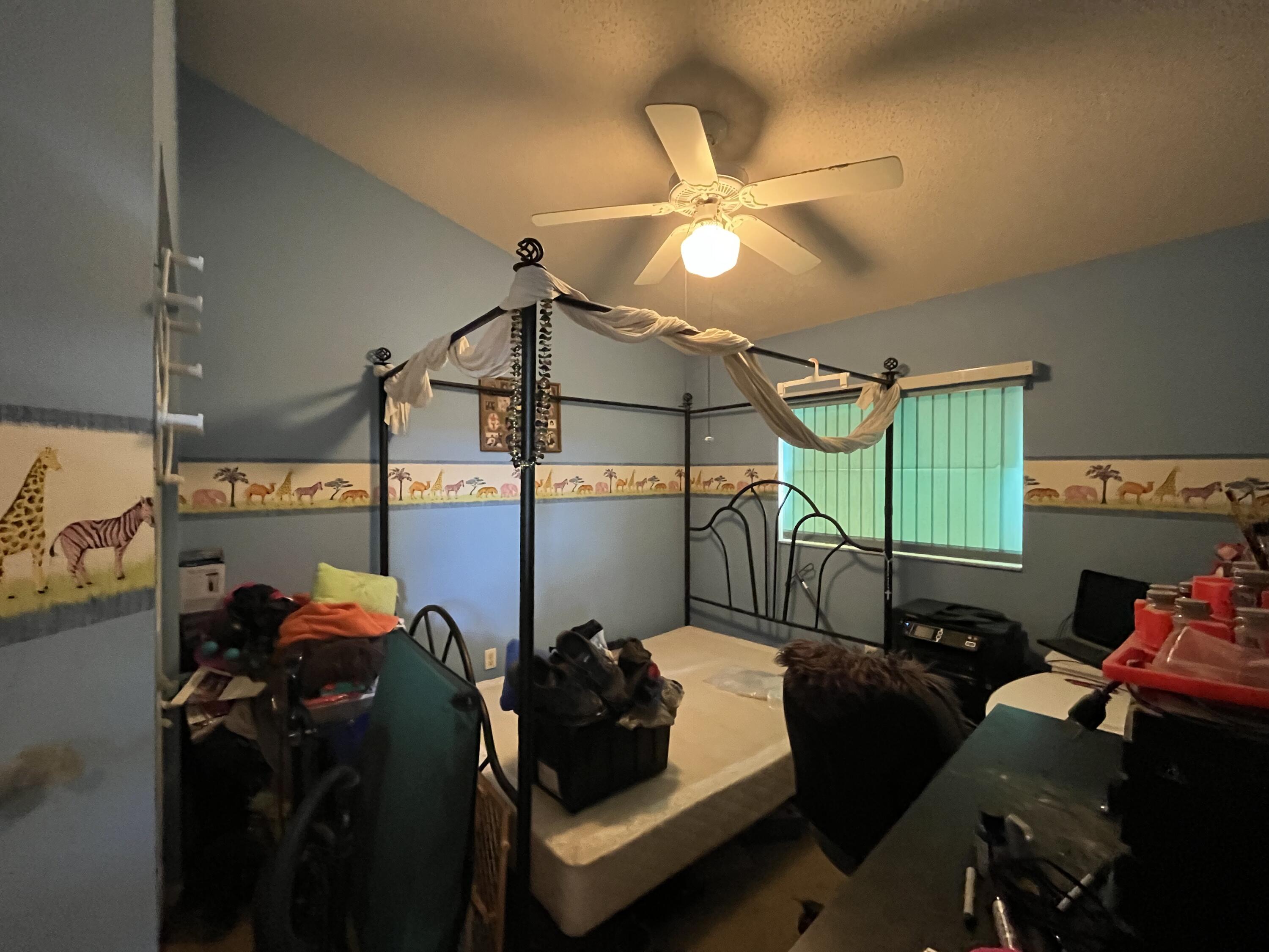 4919 Erin Lane Melbourne, FL 32940 - Photo 9 of 13 a room with musical instruments